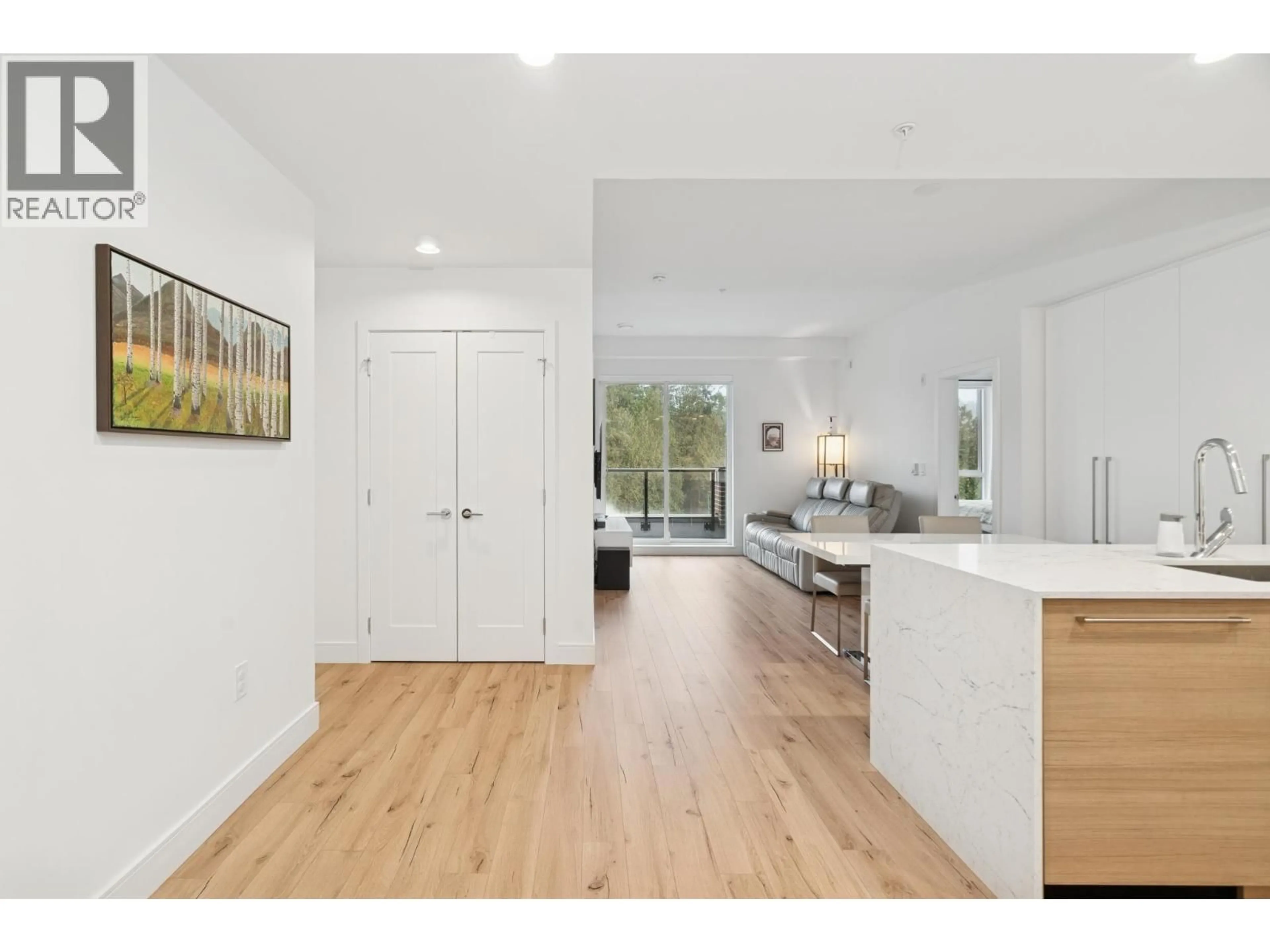 Open concept kitchen, wood/laminate floor for 420 - 55 KLAHANIE DRIVE, Port Moody British Columbia V3H0M9