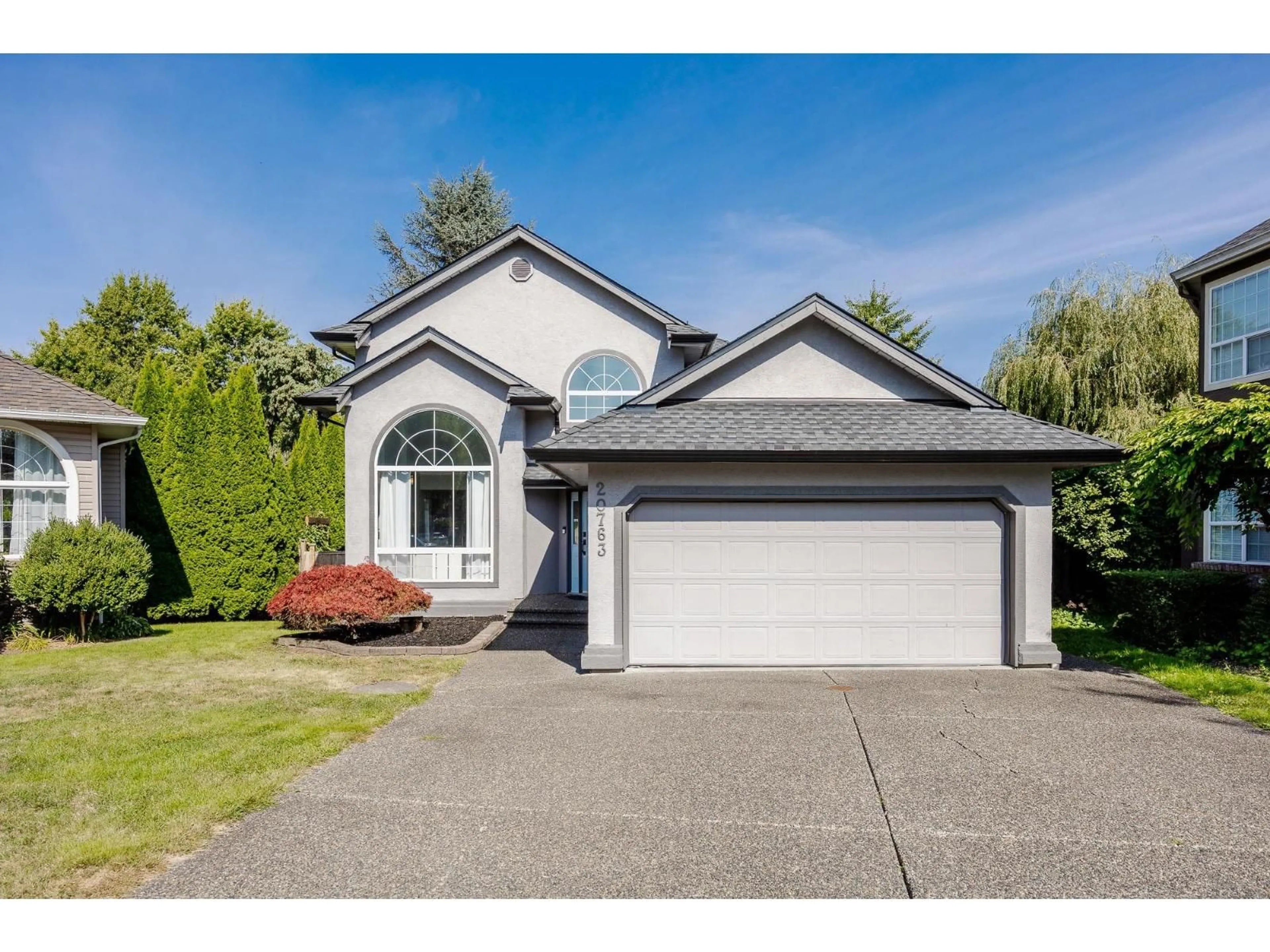 Home with vinyl exterior material, street for 20763 91A AVENUE, Langley British Columbia V1M2P6
