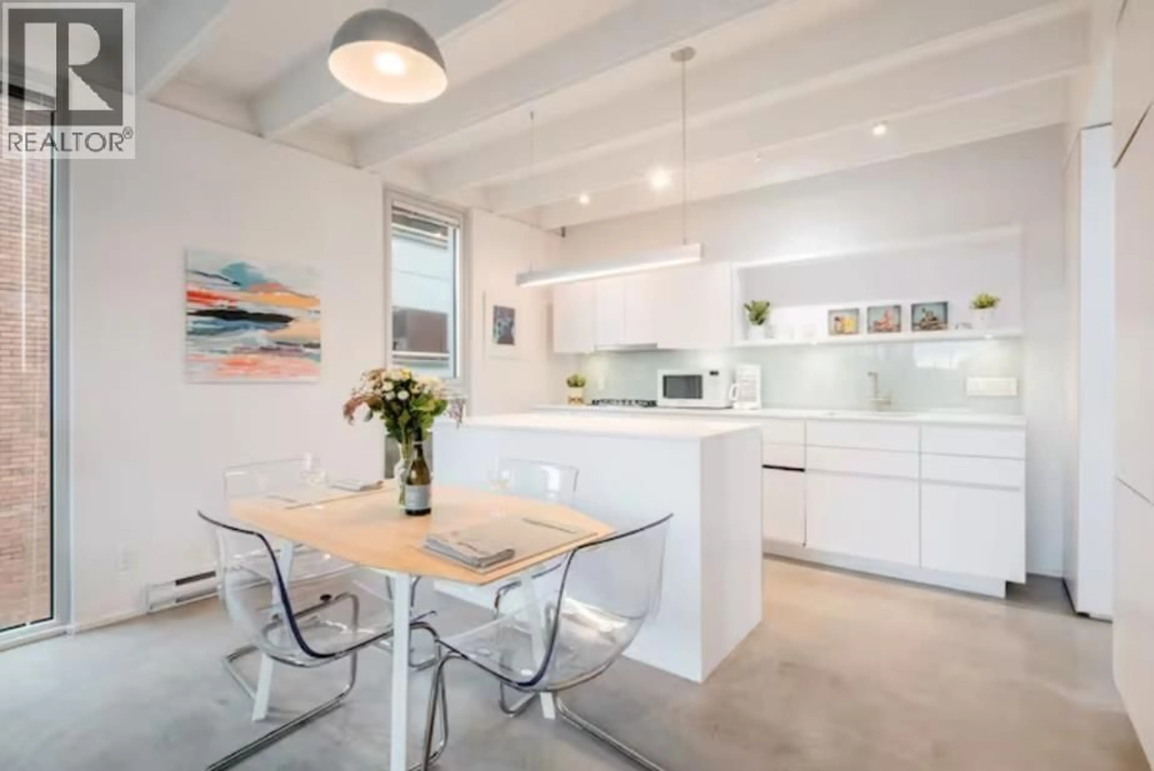 Open concept kitchen, ceramic/tile floor for 701 - 219 GEORGIA STREET, Vancouver British Columbia V6A1Z6