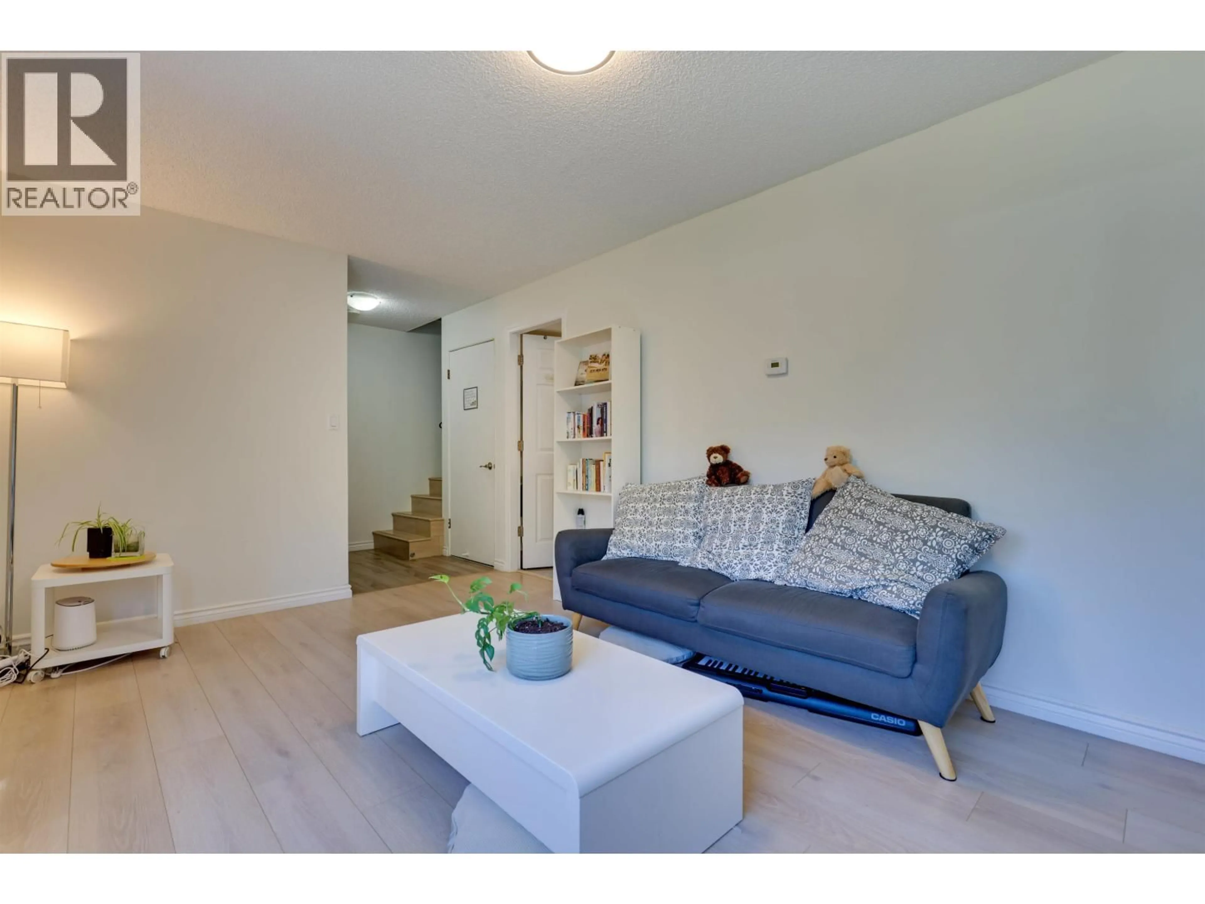 Living room with furniture, wood/laminate floor for 76 - 3437 49TH AVENUE, Vancouver British Columbia V5S1M1