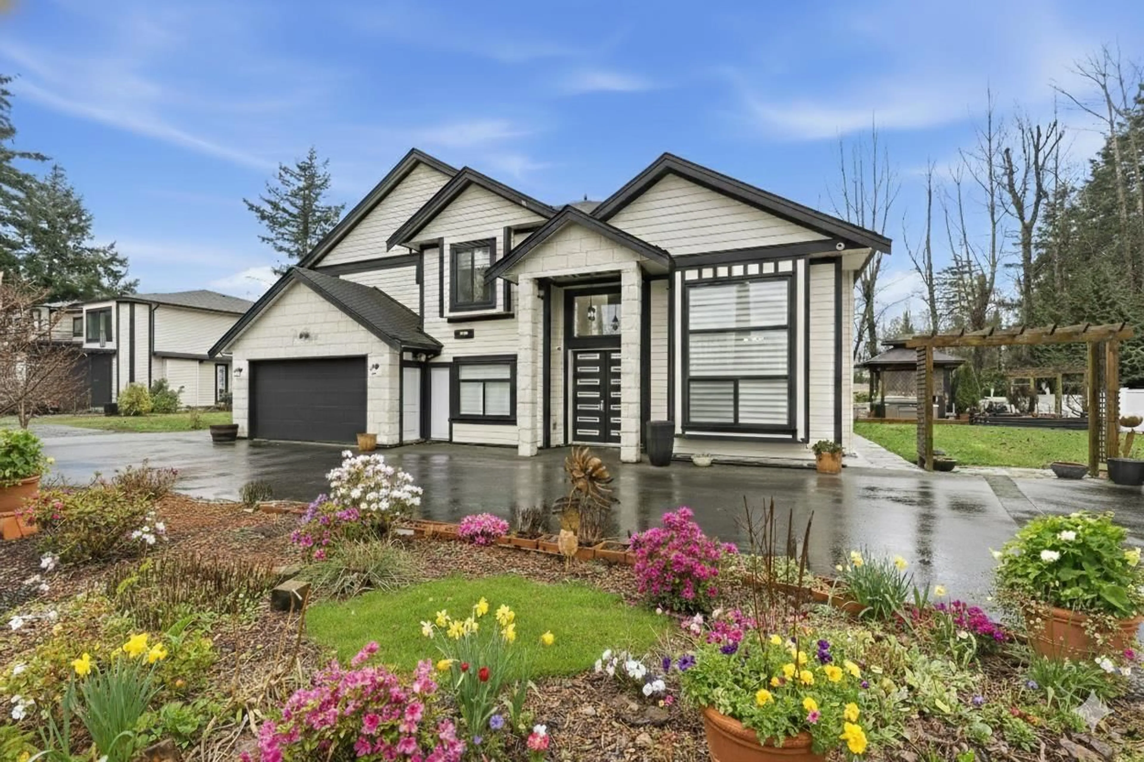 Home with vinyl exterior material, street for 2365 264 STREET, Langley British Columbia V4W2L5