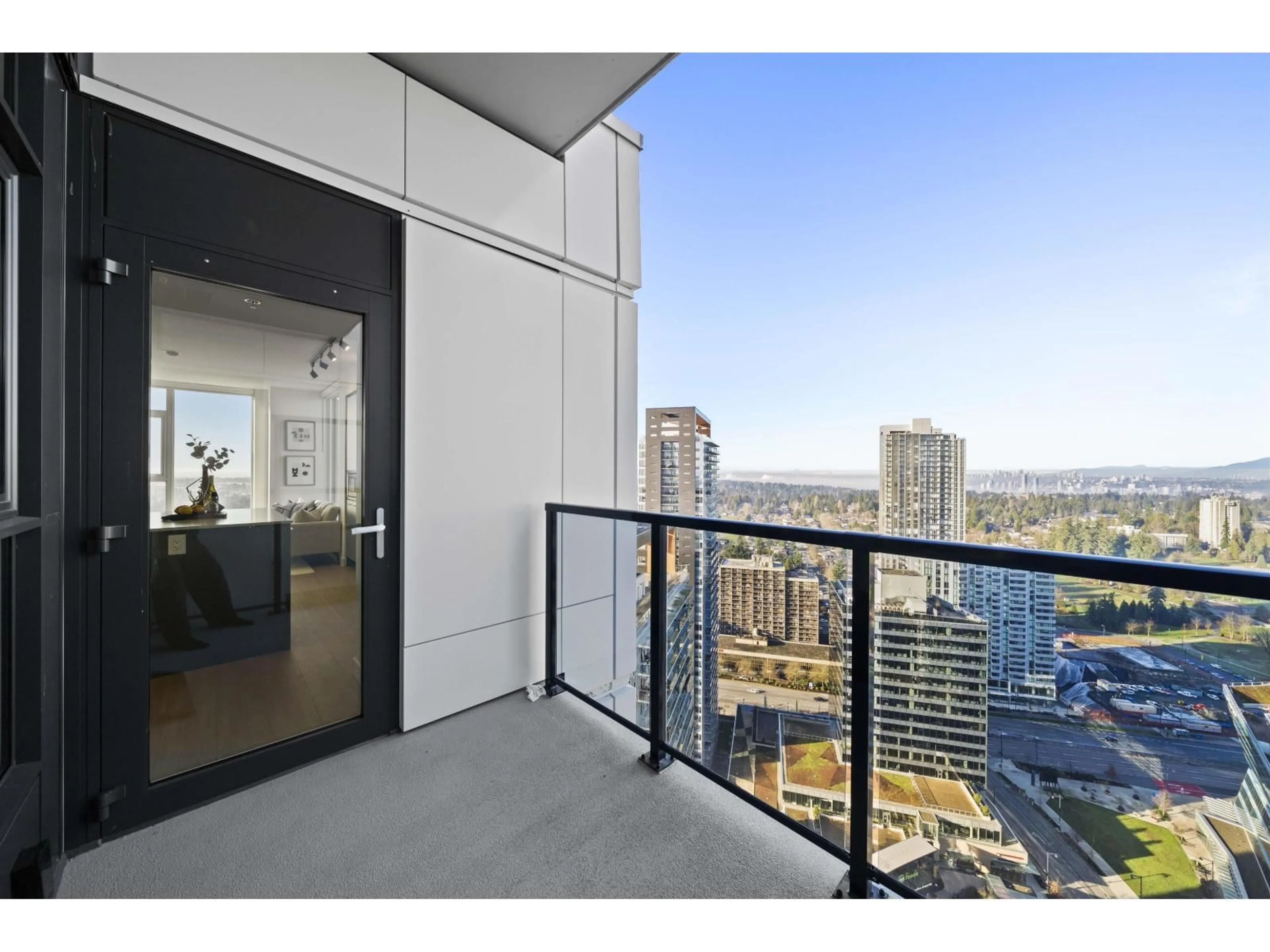 Balcony in the apartment, city buildings view from balcony for 3303 - 13745 GEORGE JUNCTION, Surrey British Columbia V3T4Y3