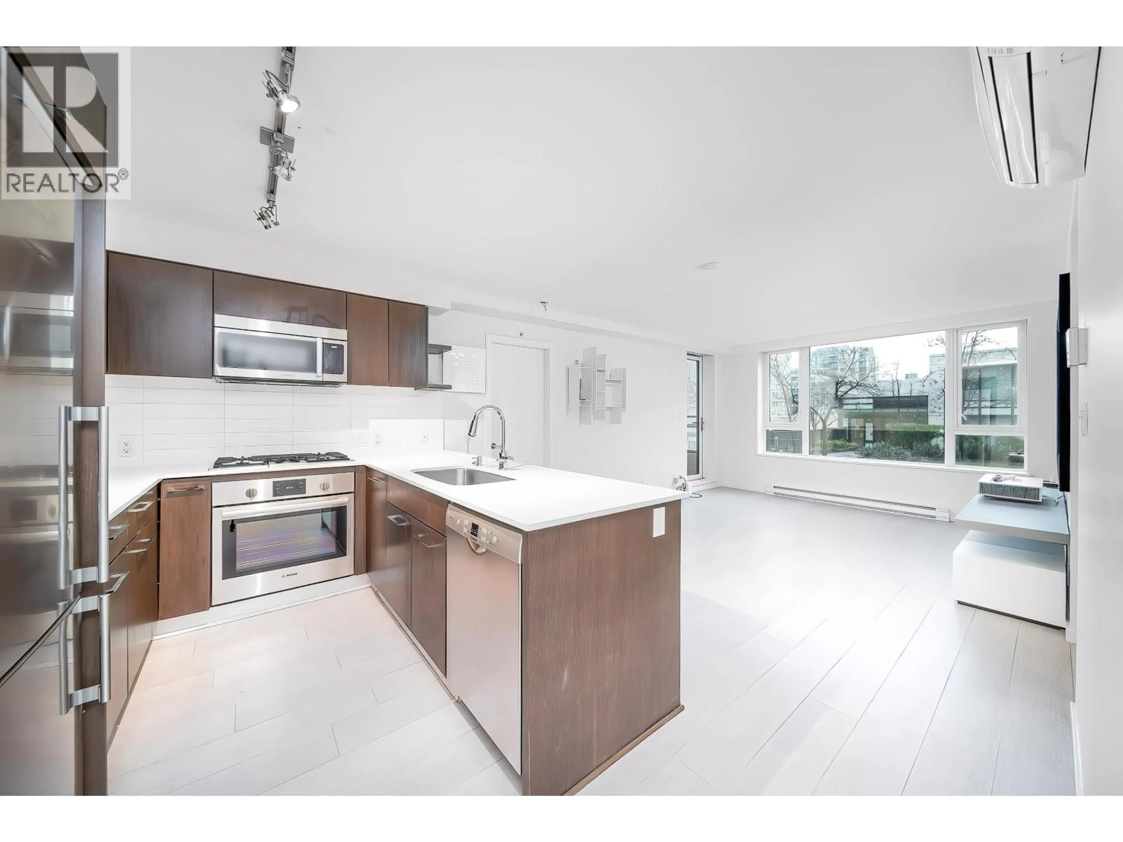 Open concept kitchen, ceramic/tile floor for 701 - 7888 ACKROYD ROAD, Richmond British Columbia V6X0K6