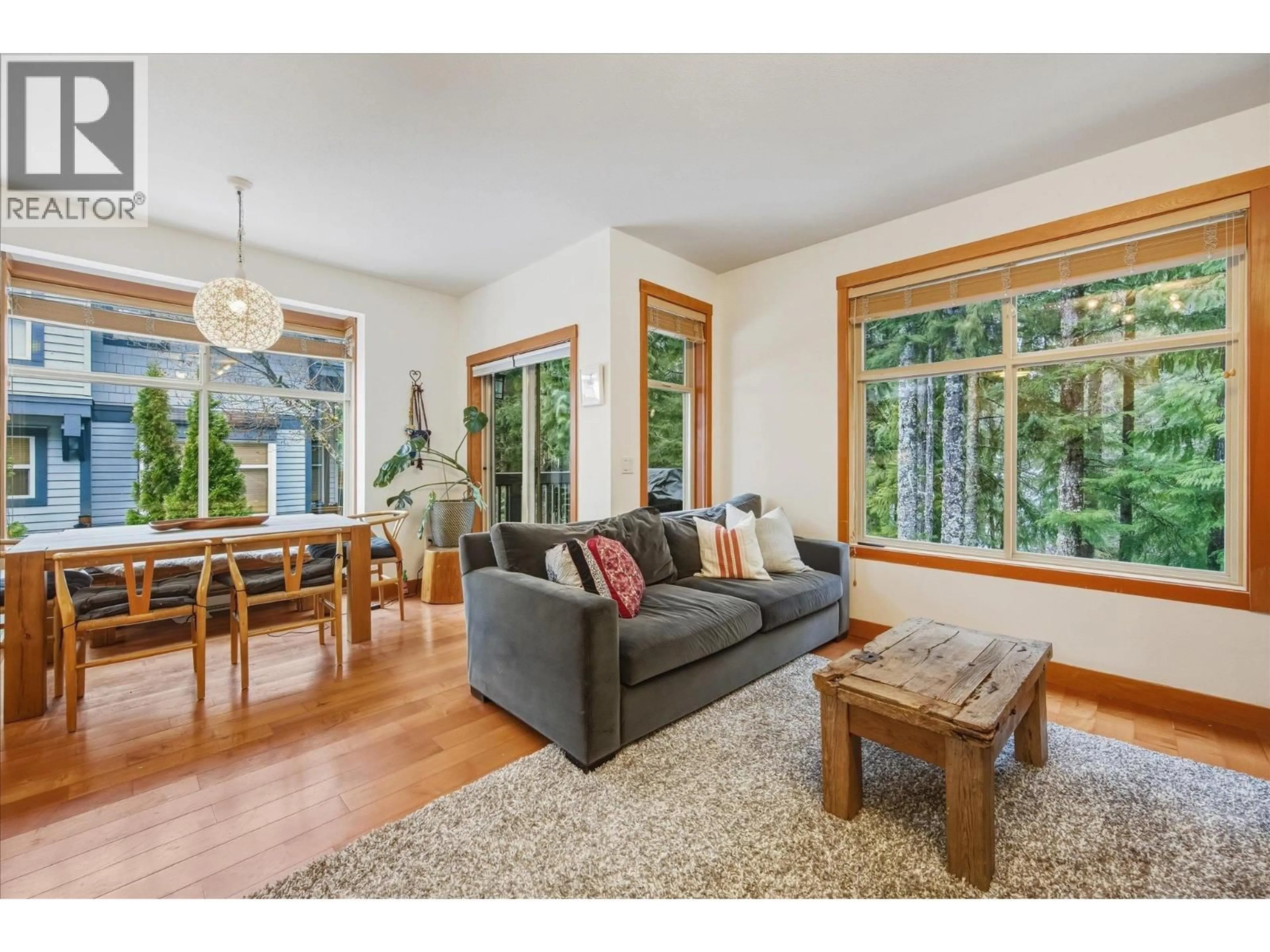Living room with furniture, wood/laminate floor for 20 - 1530 TYNEBRIDGE LANE, Whistler British Columbia V8E0L3