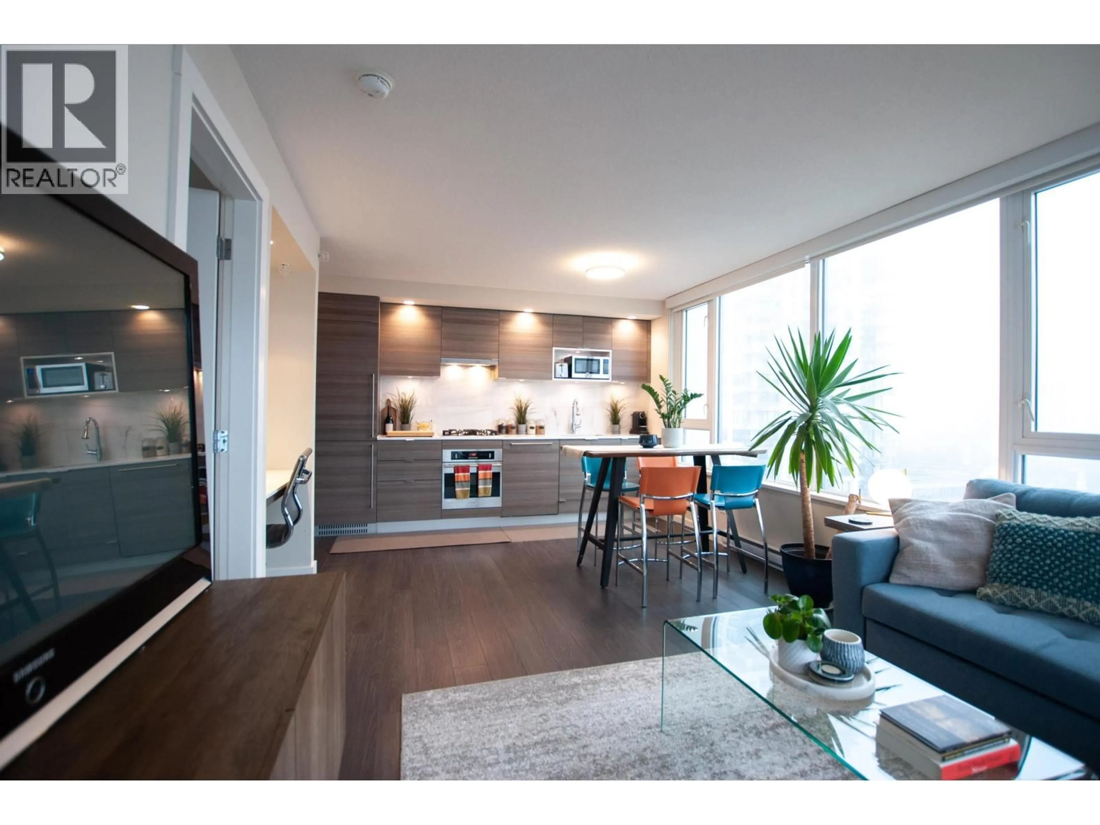 Open concept kitchen, wood/laminate floor for 1507 - 602 COMO LAKE AVENUE, Coquitlam British Columbia V3J0G2