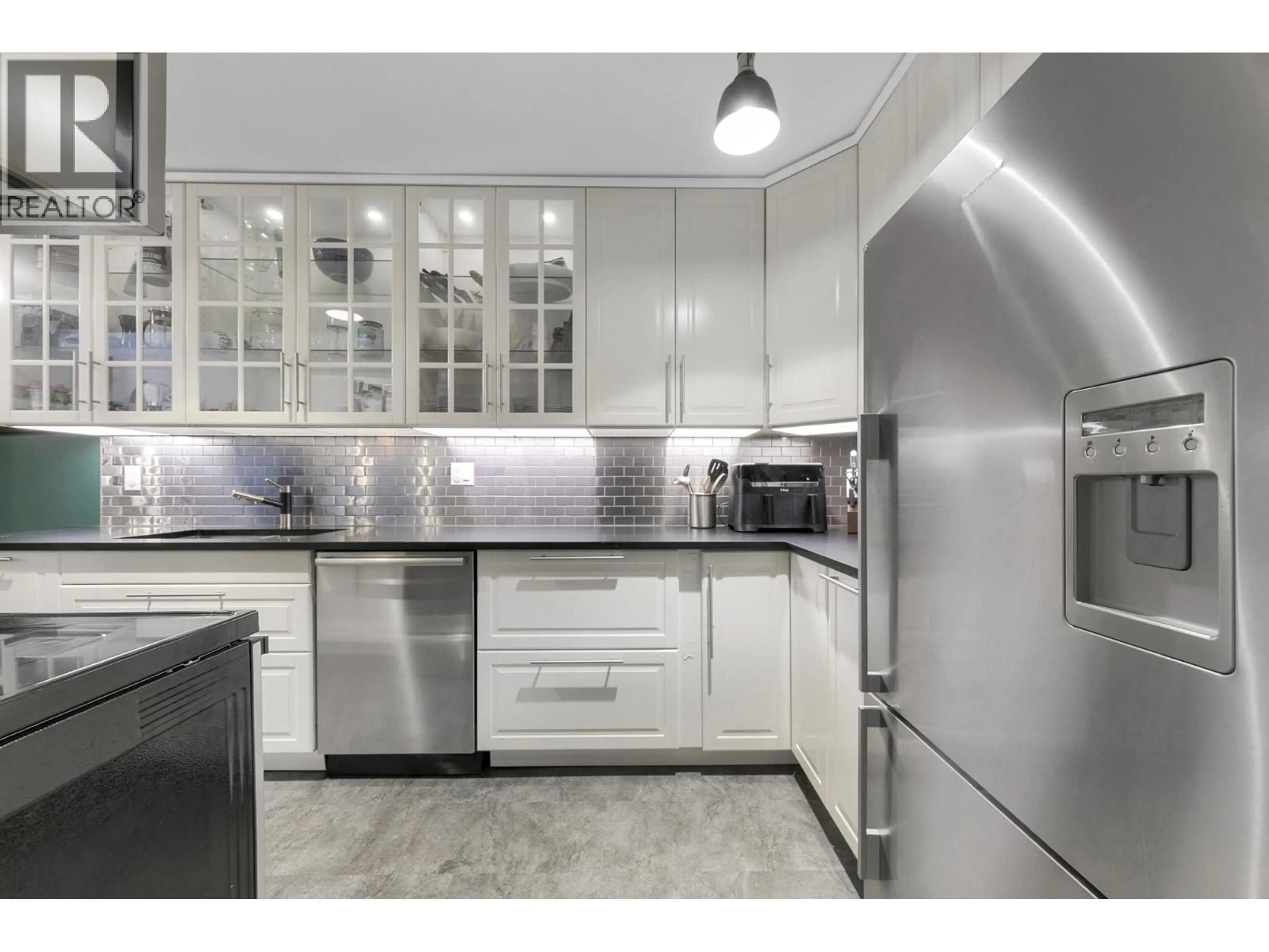 Contemporary kitchen, ceramic/tile floor for 326 - 9101 HORNE STREET STREET, Burnaby British Columbia V3N4M3