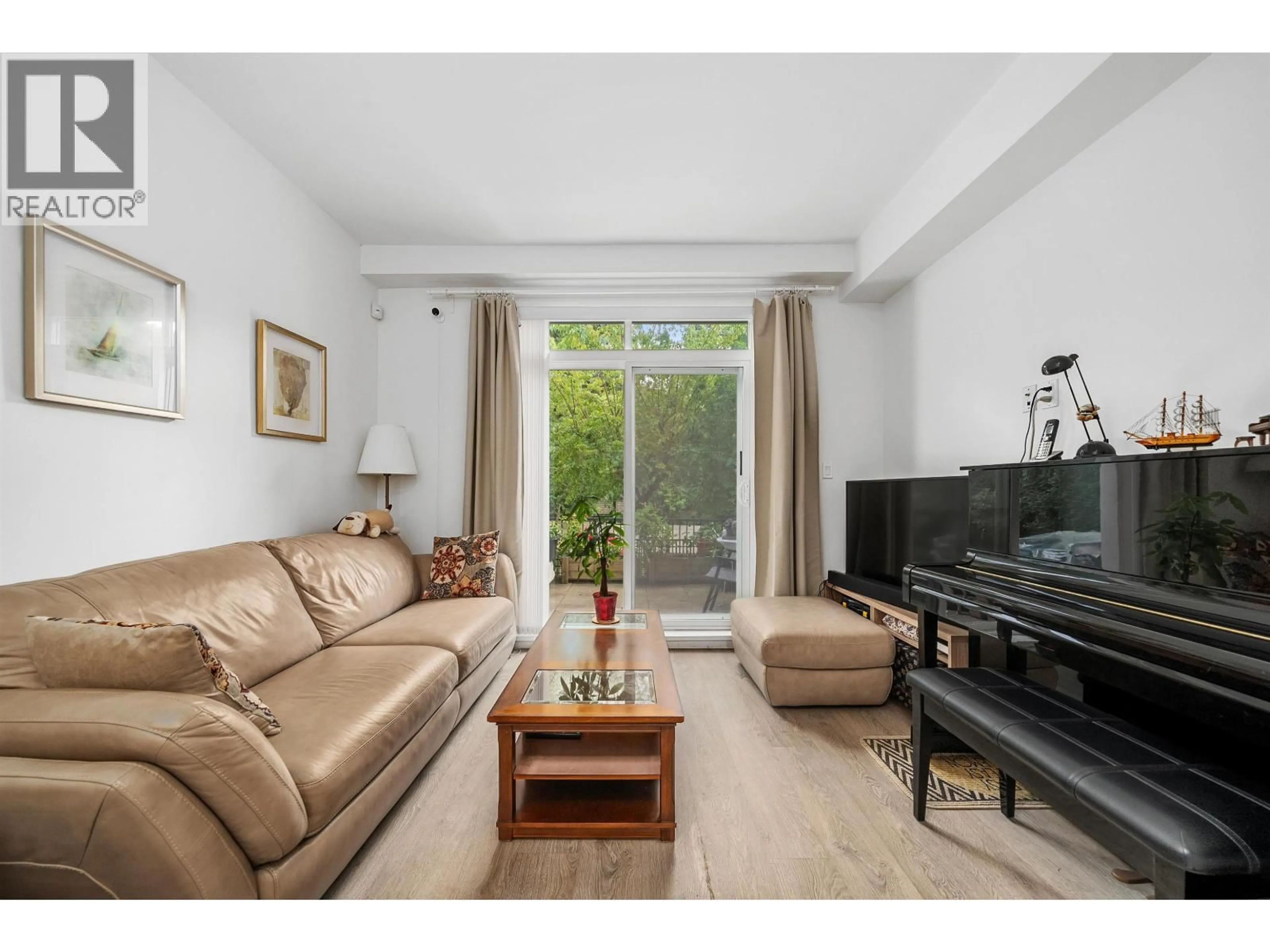 Living room with furniture, unknown for 119 - 7250 18TH AVENUE, Burnaby British Columbia V3N1H3