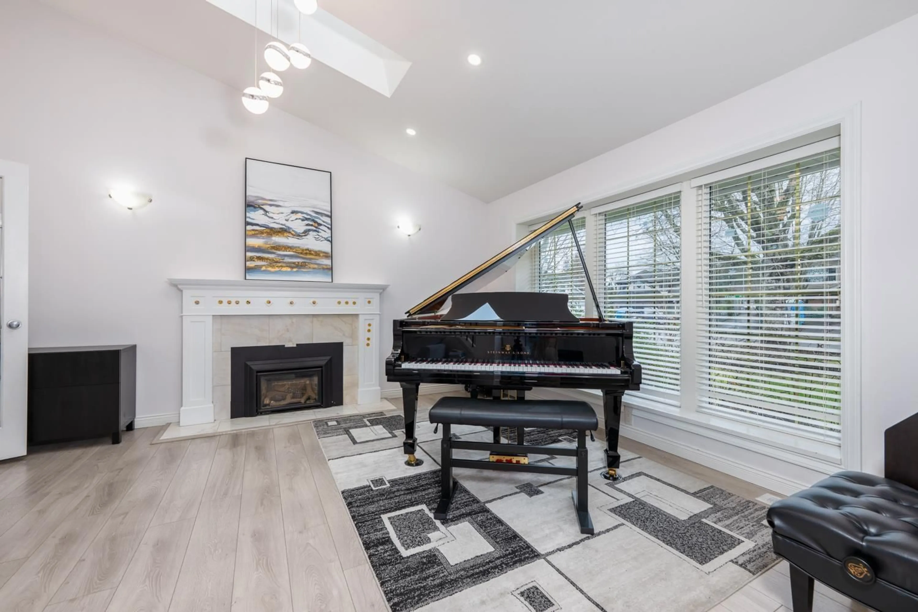 Living room with furniture, wood/laminate floor for 8769 215B STREET, Langley British Columbia V1M2E6