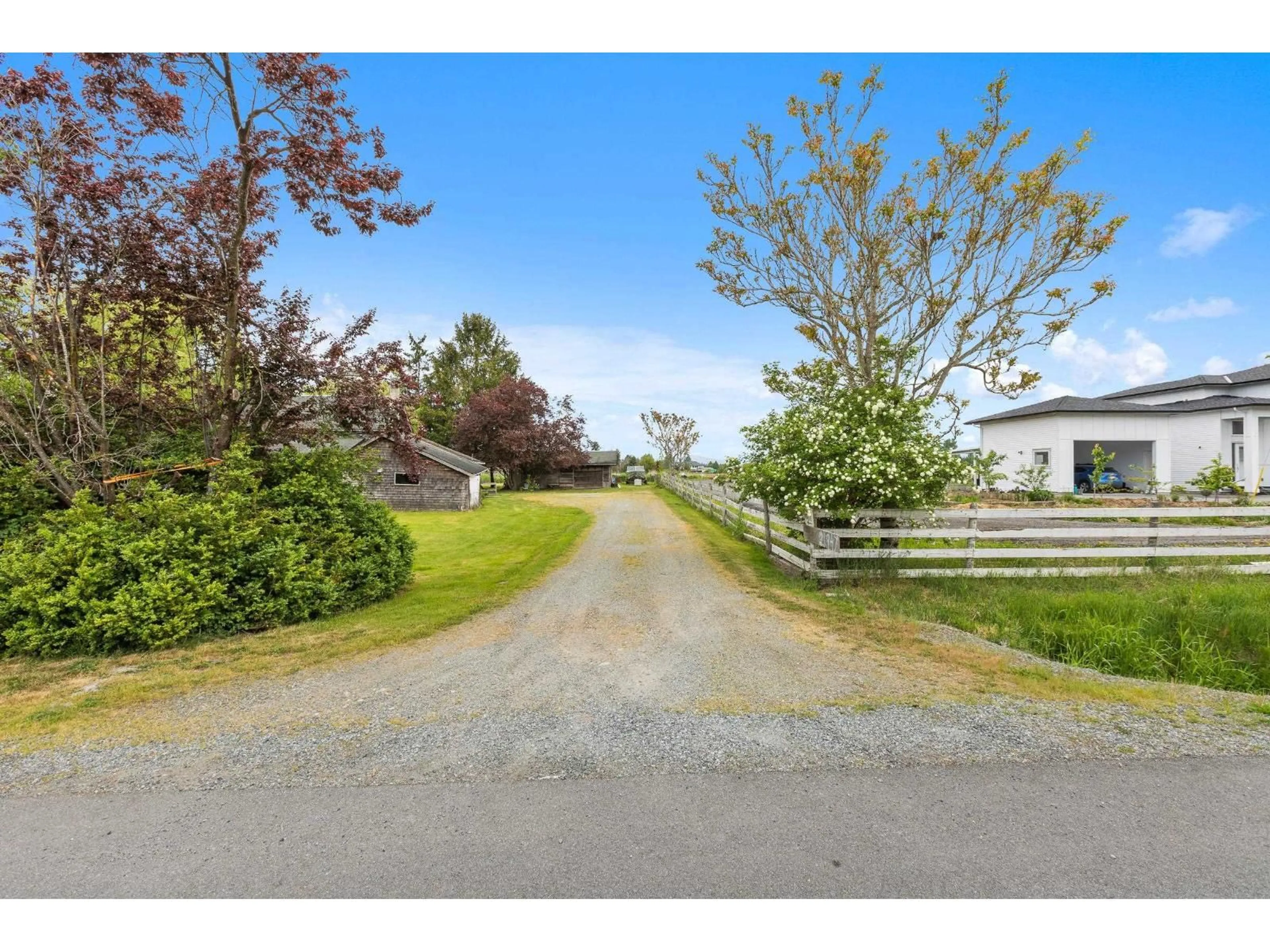 A pic from outside/outdoor area/front of a property/back of a property/a pic from drone, street for 21947 61 AVENUE, Langley British Columbia V2Y2P2