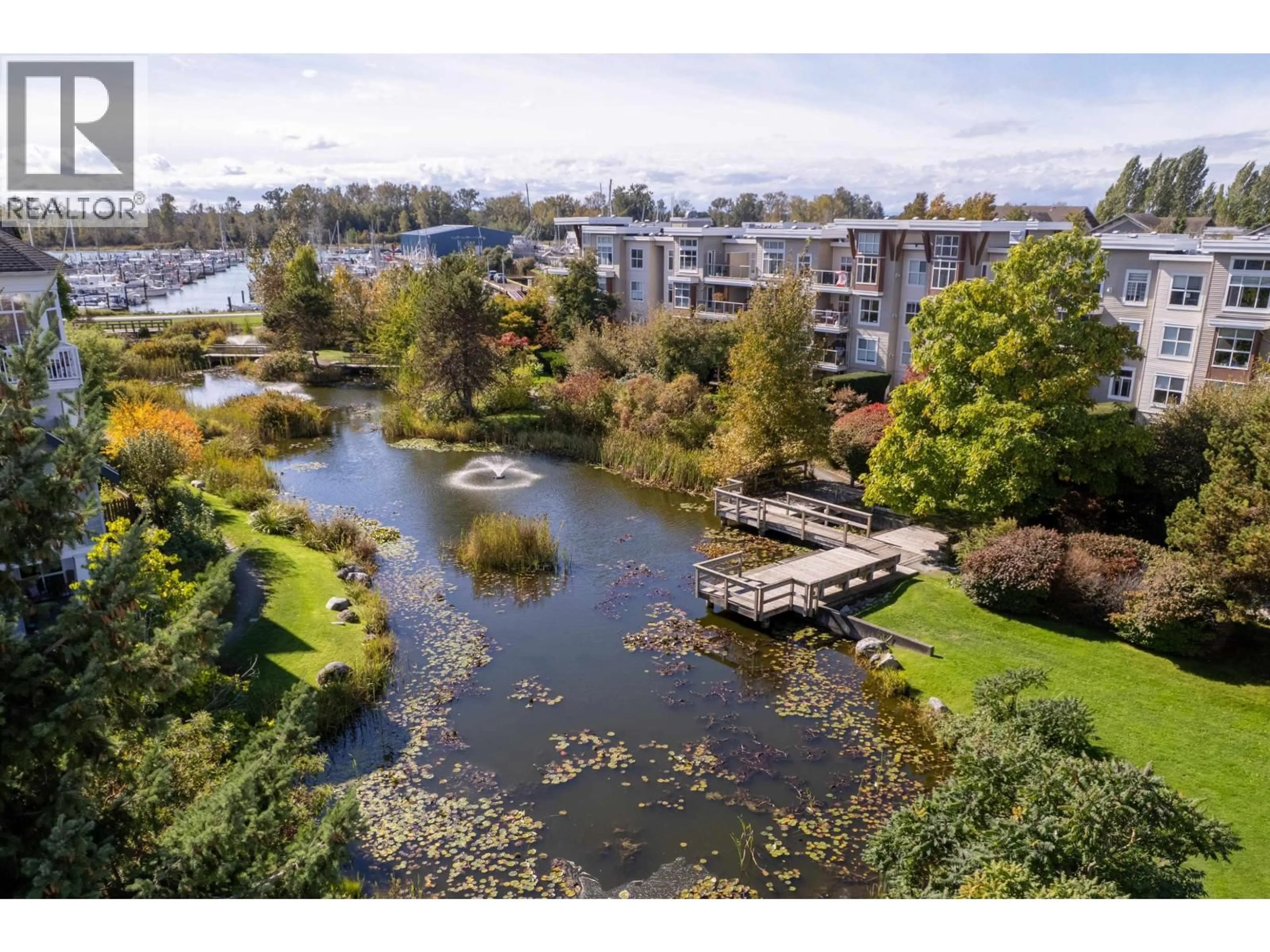 A pic from outside/outdoor area/front of a property/back of a property/a pic from drone, water/lake/river/ocean view for 125 - 5700 ANDREWS ROAD, Richmond British Columbia V7E6N7