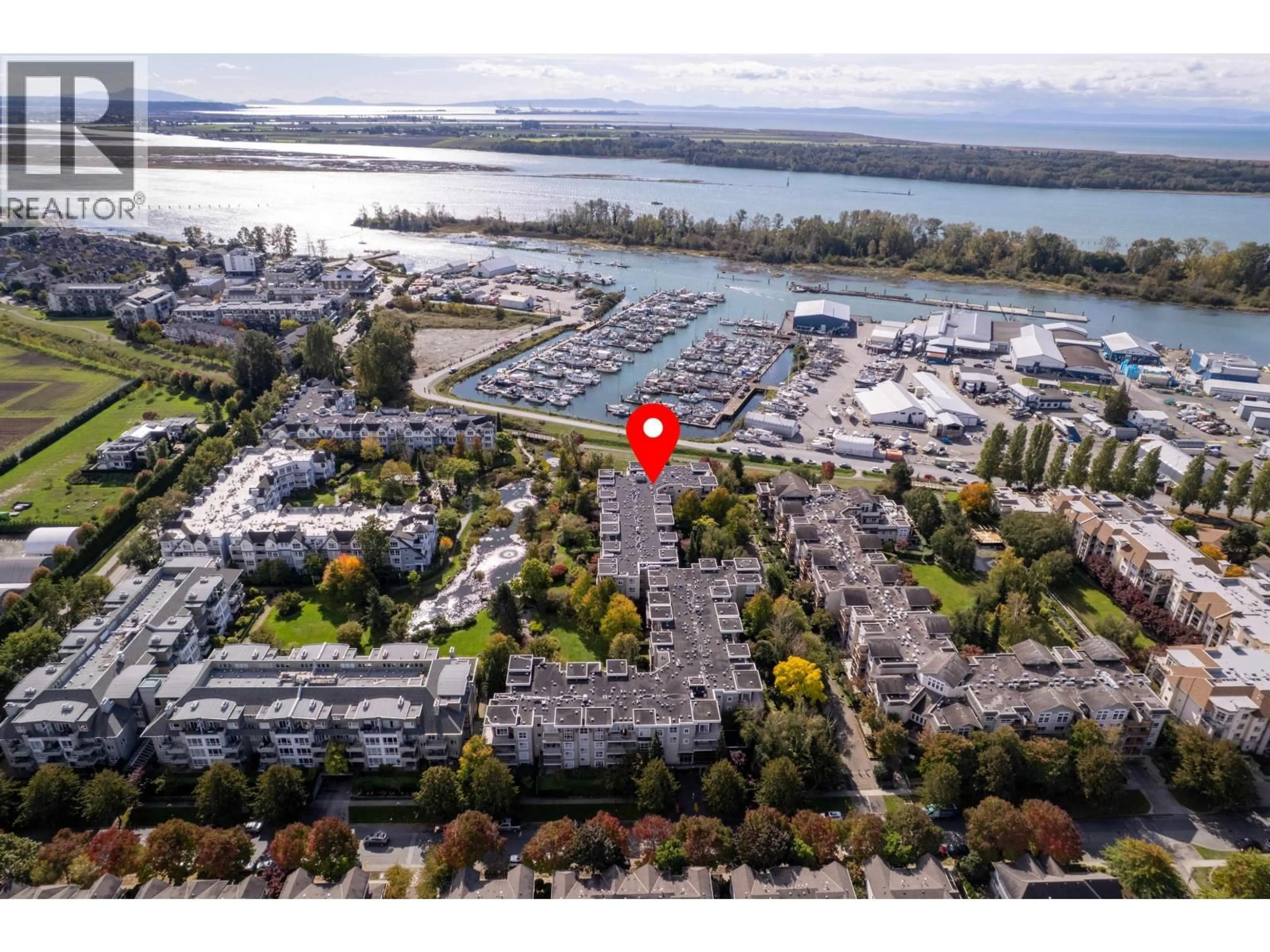 A pic from outside/outdoor area/front of a property/back of a property/a pic from drone, water/lake/river/ocean view for 125 - 5700 ANDREWS ROAD, Richmond British Columbia V7E6N7