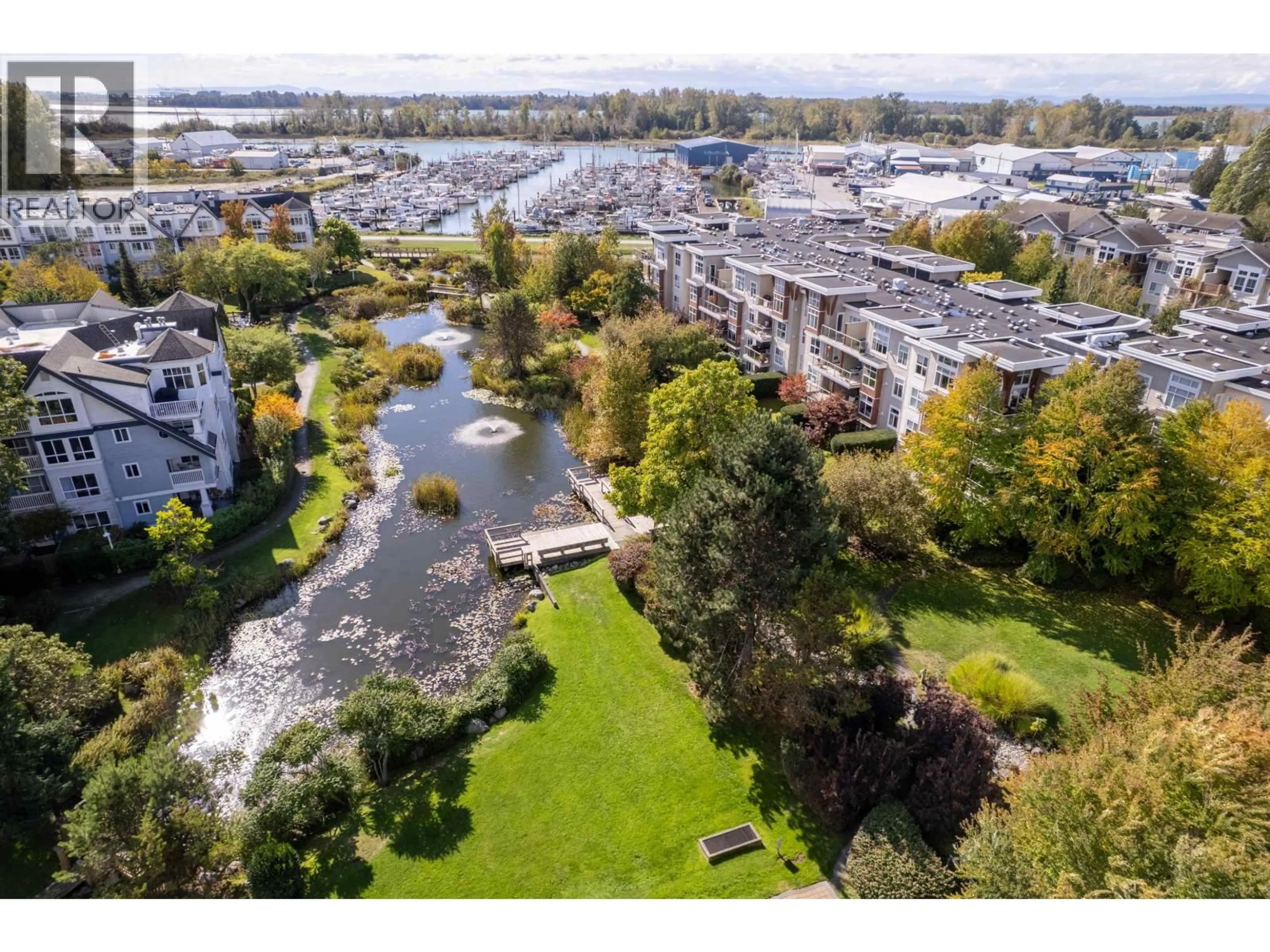 A pic from outside/outdoor area/front of a property/back of a property/a pic from drone, water/lake/river/ocean view for 125 - 5700 ANDREWS ROAD, Richmond British Columbia V7E6N7