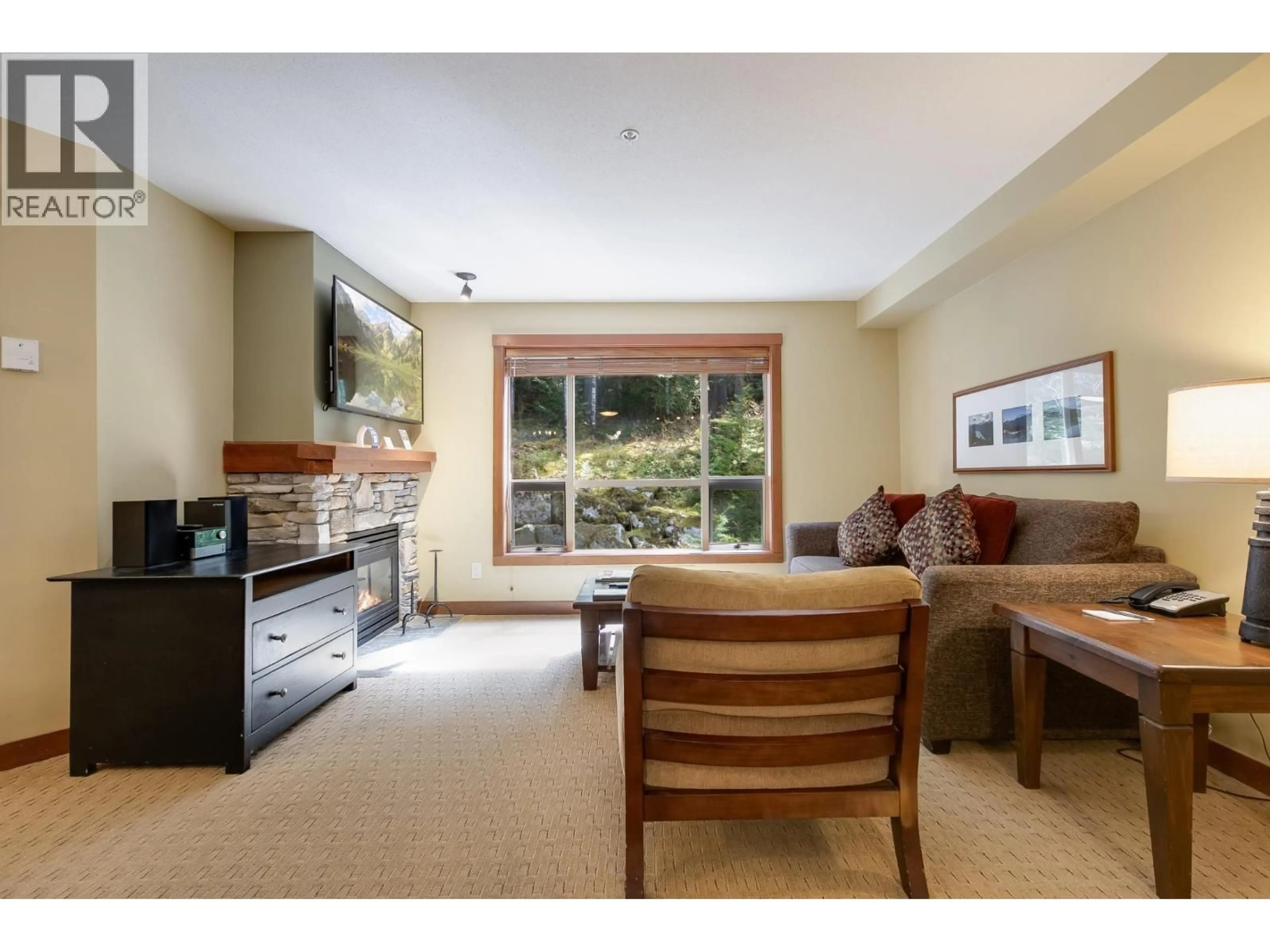 Living room with furniture, unknown for 214G4 - 4653 BLACKCOMB WAY, Whistler British Columbia V8E0Y9