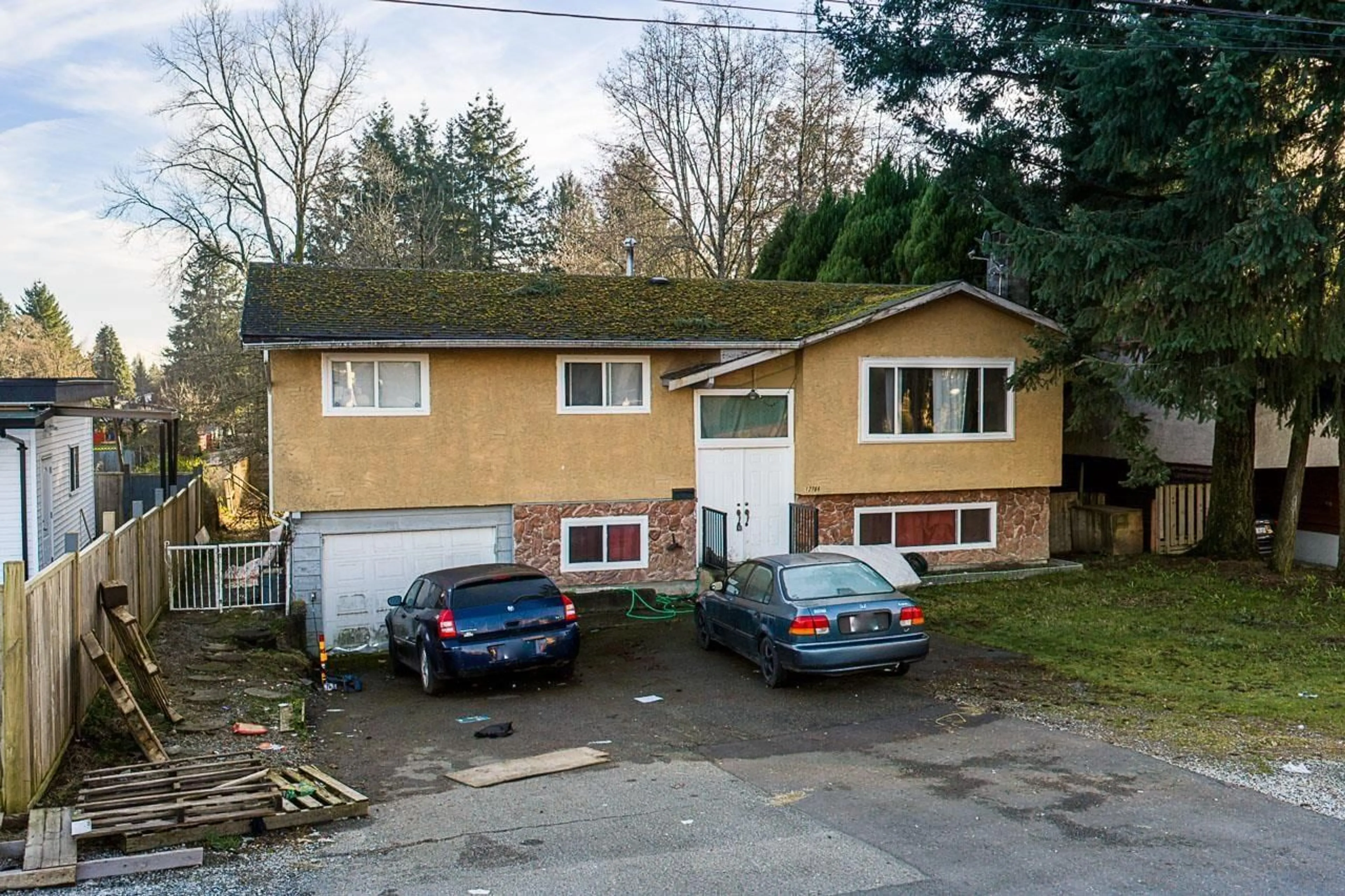 A pic from outside/outdoor area/front of a property/back of a property/a pic from drone, street for 12788 102 AVENUE, Surrey British Columbia V3V3E5