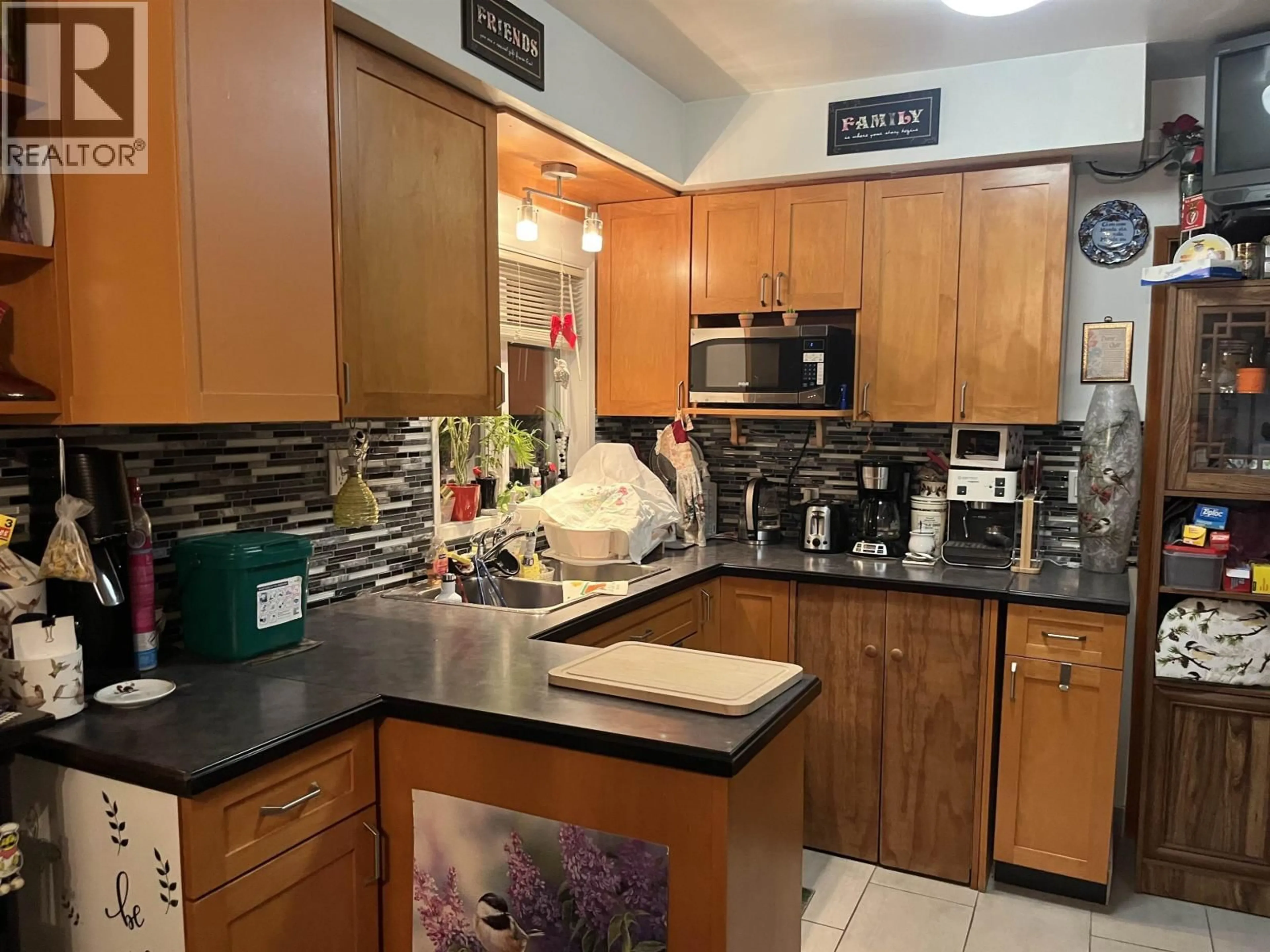 Standard kitchen, ceramic/tile floor for 4042 NOOTKA STREET, Vancouver British Columbia V5R2E2