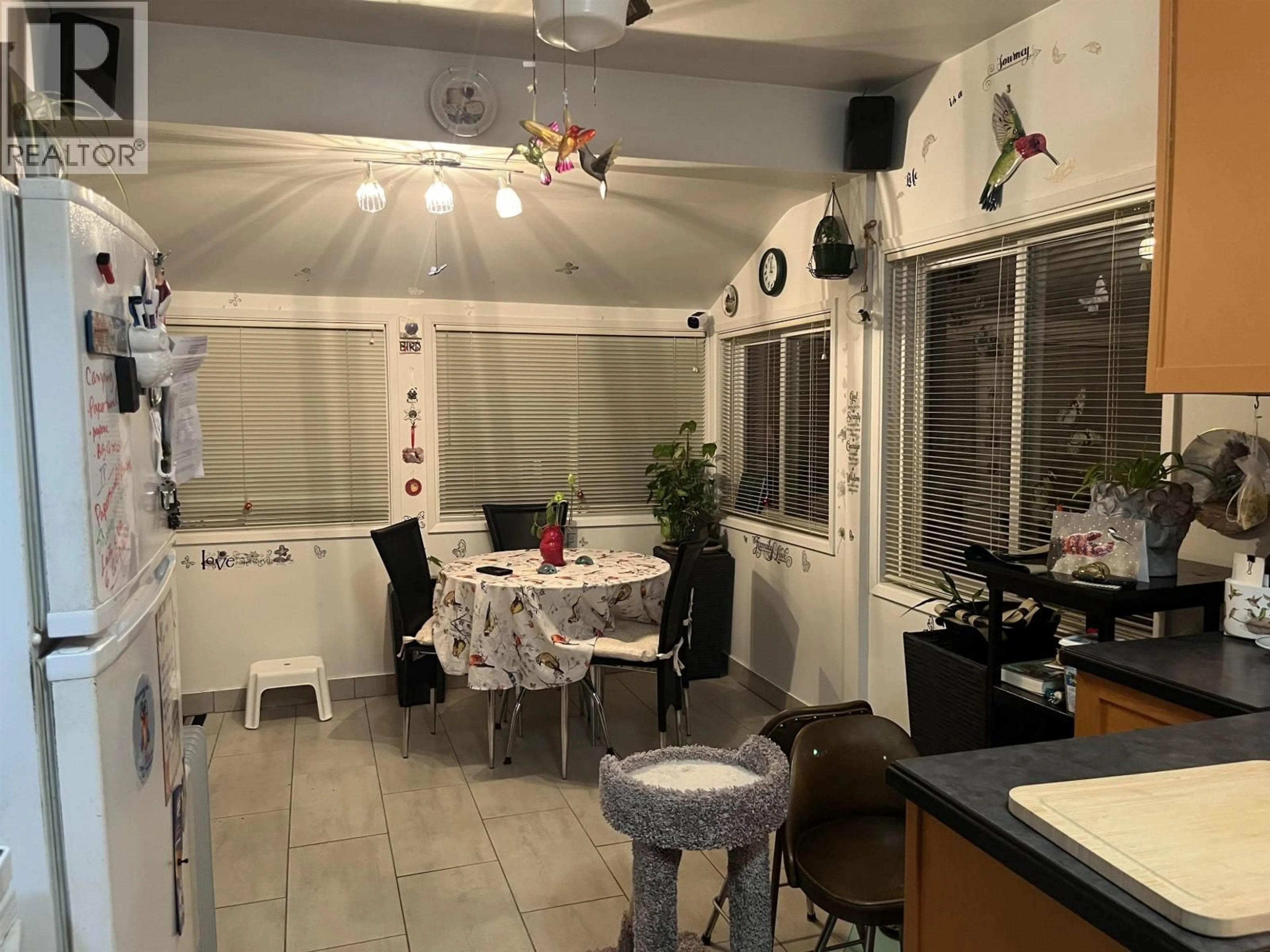 Dining room, ceramic/tile floor for 4042 NOOTKA STREET, Vancouver British Columbia V5R2E2