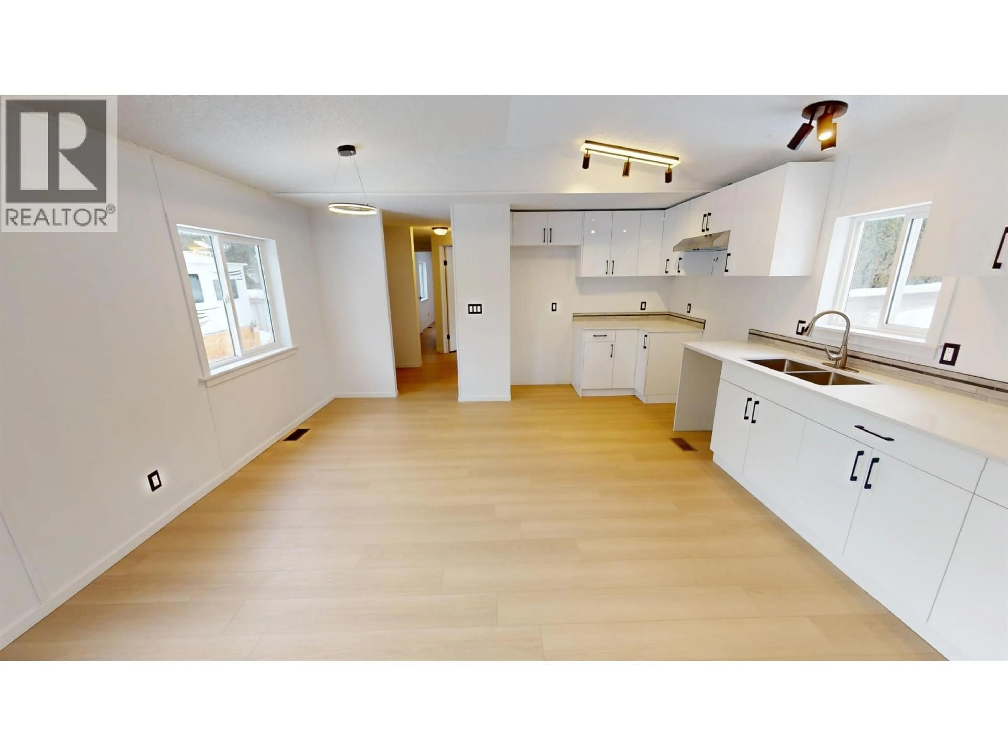Open concept kitchen, wood/laminate floor for 24 - 654 NORTH FRASER DRIVE, Quesnel British Columbia V2J1Z6