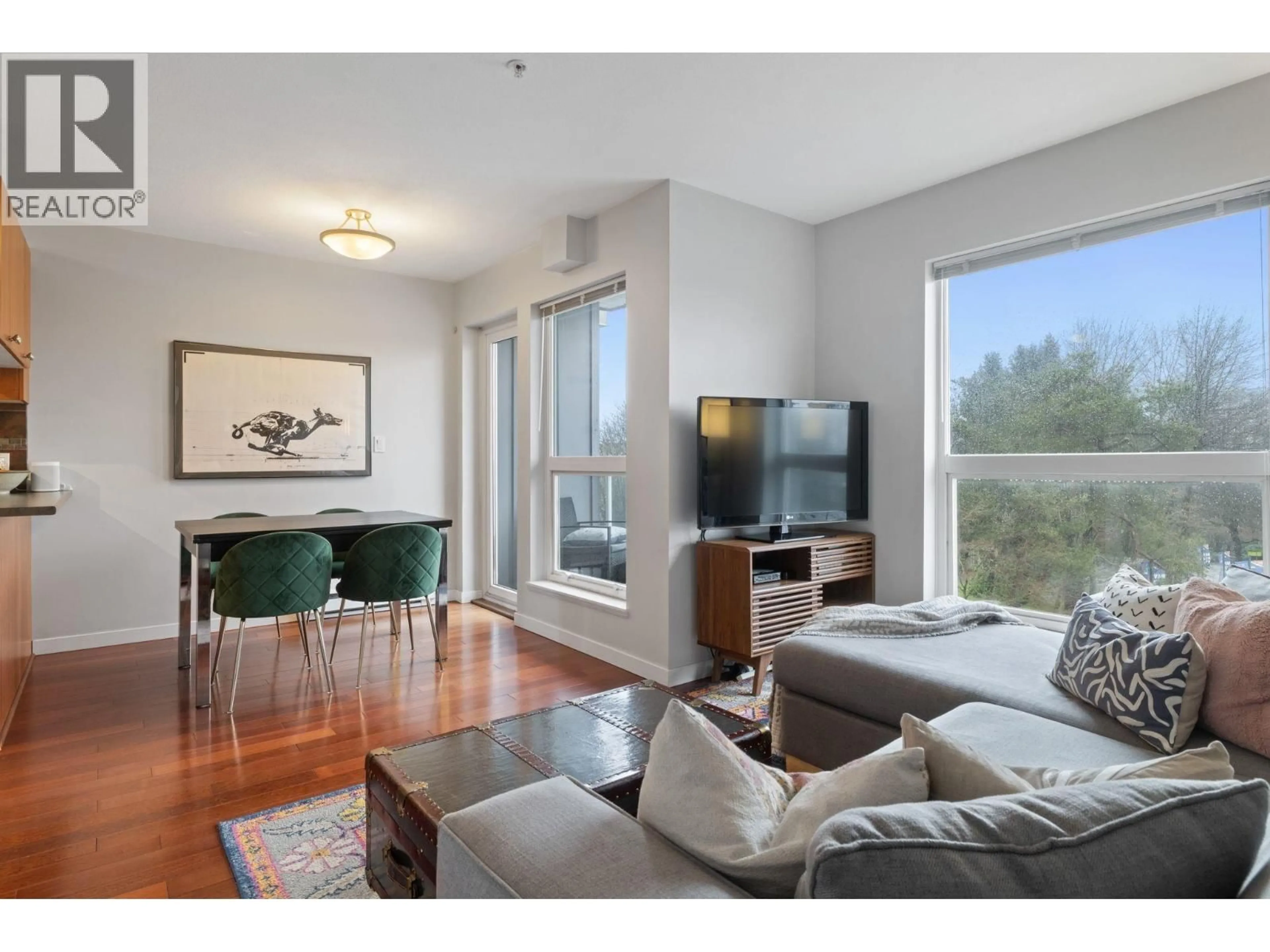 Living room with furniture, wood/laminate floor for 412 - 2891 HASTINGS STREET, Vancouver British Columbia V5K5J8