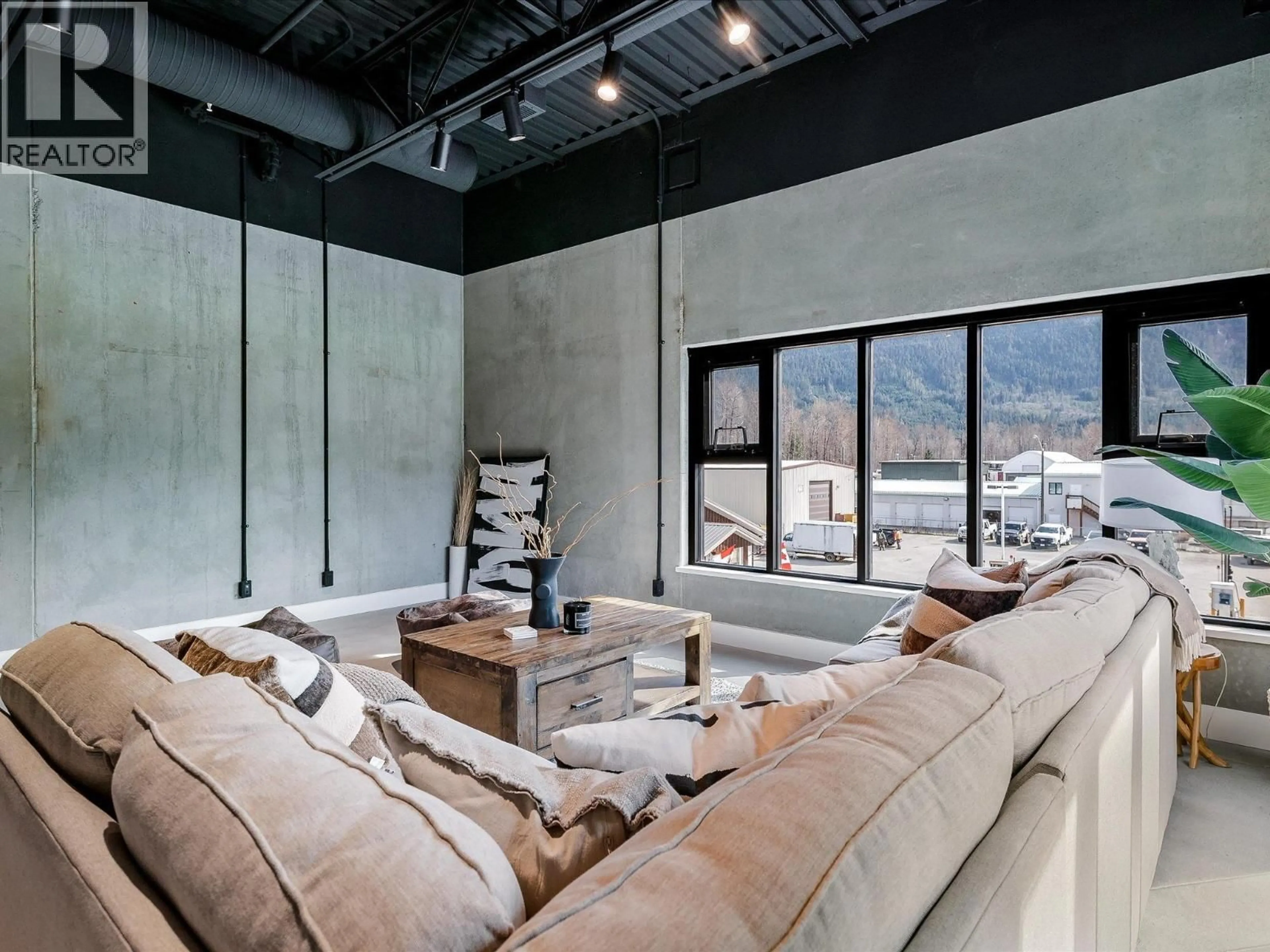 Living room with furniture, cement floor for 24 - 7342 INDUSTRIAL WAY, Pemberton British Columbia V0N2L0