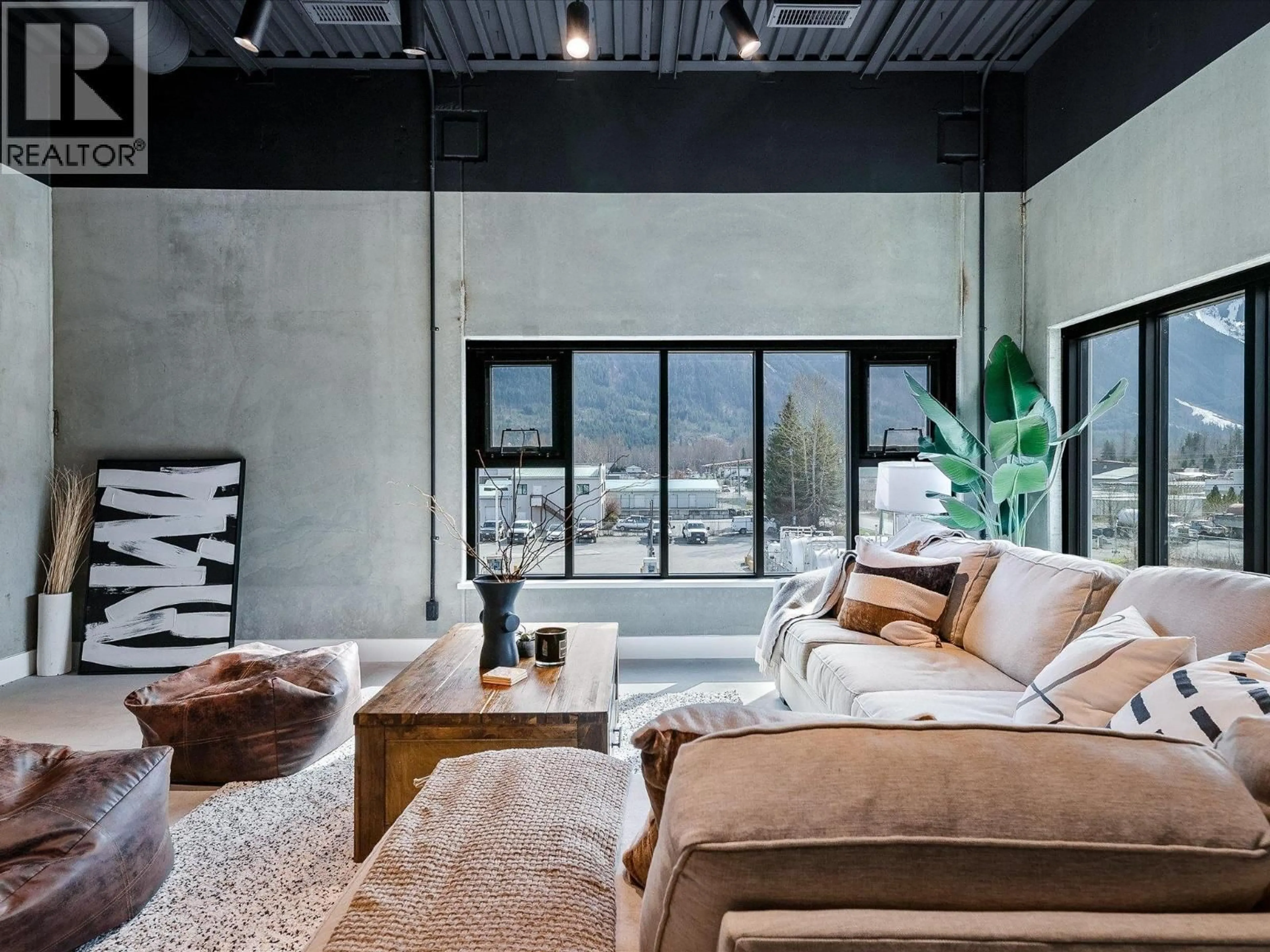 Living room with furniture, cement floor for 24 - 7342 INDUSTRIAL WAY, Pemberton British Columbia V0N2L0