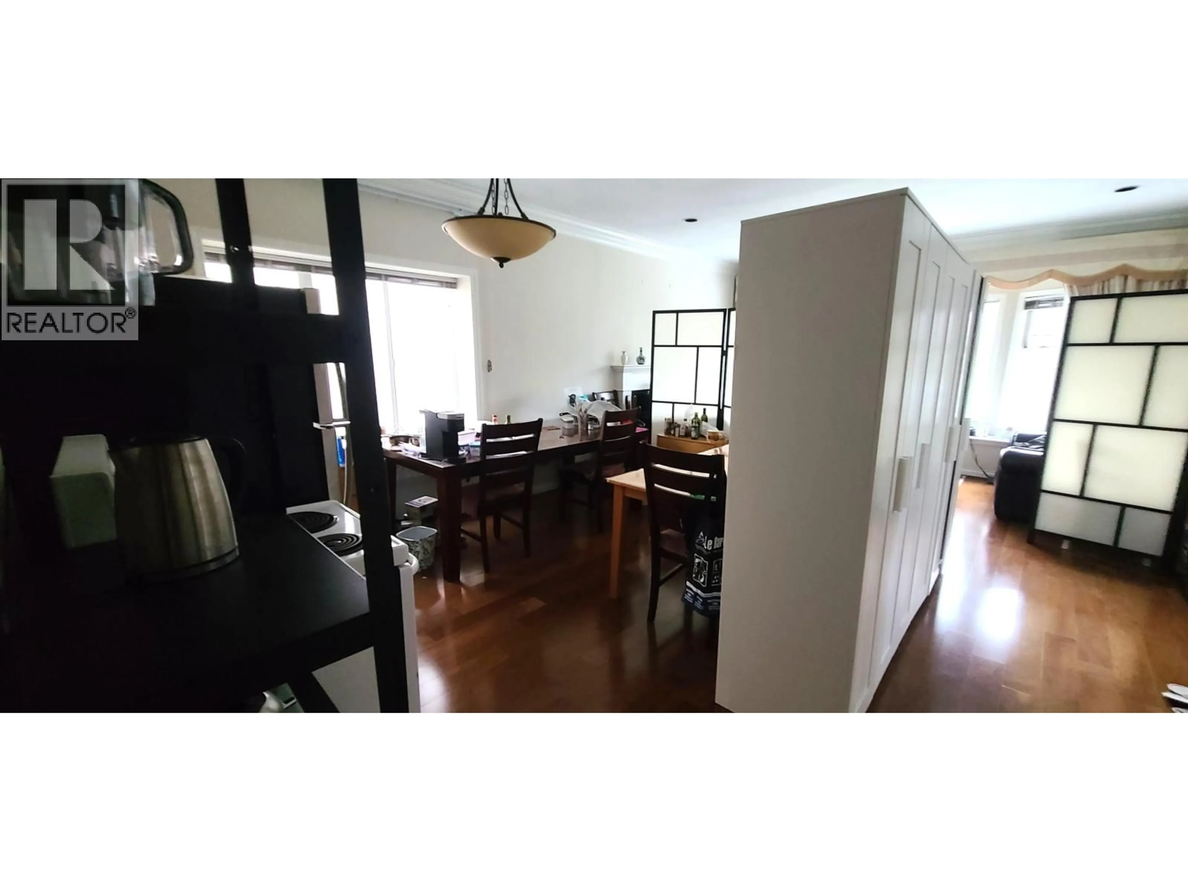 Dining room, wood/laminate floor for 8038 MONTCALM STREET, Vancouver British Columbia V6P4P5