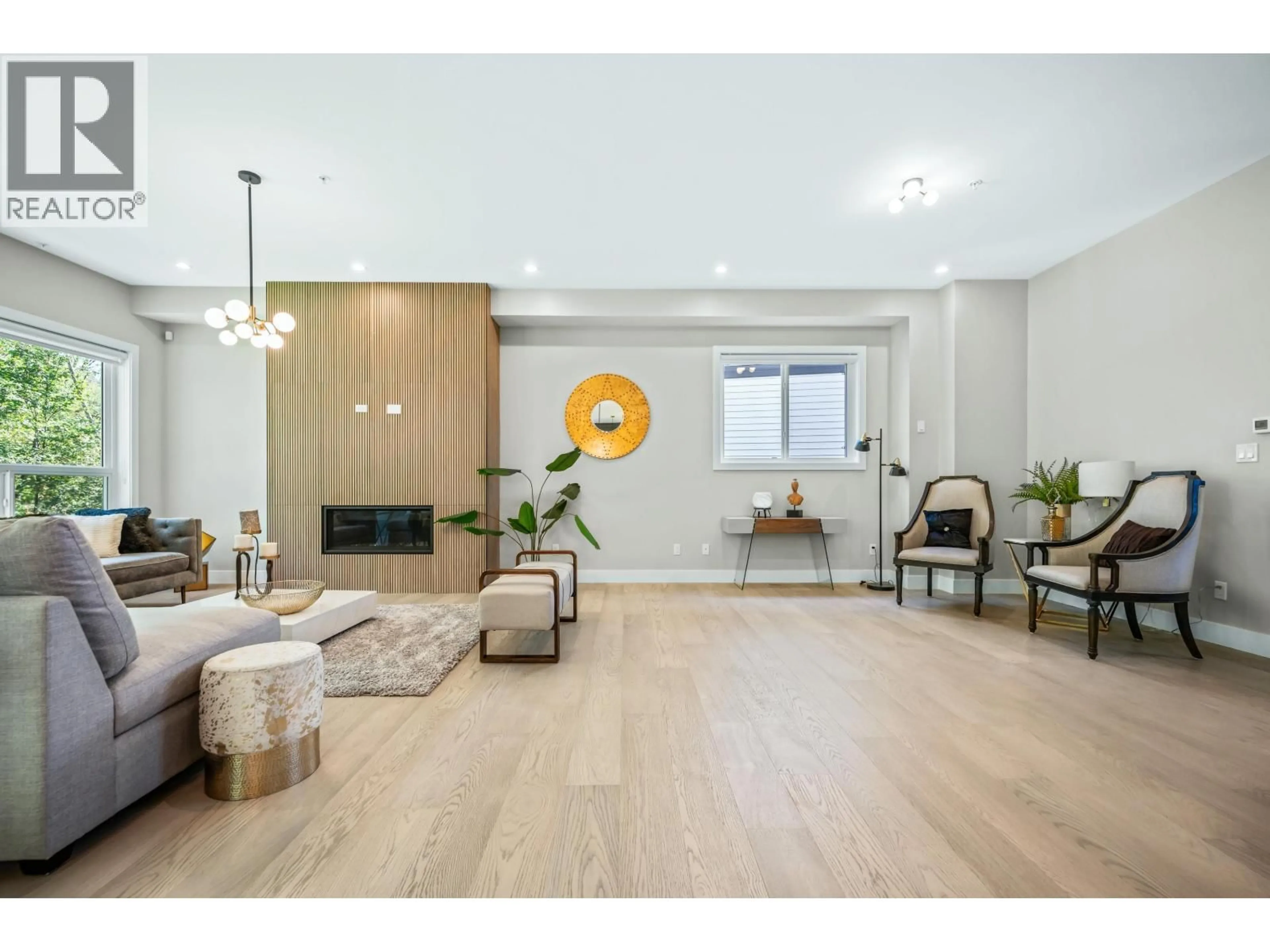 Living room with furniture, wood/laminate floor for 24469 JENEWEIN DRIVE, Maple Ridge British Columbia V2W1H8