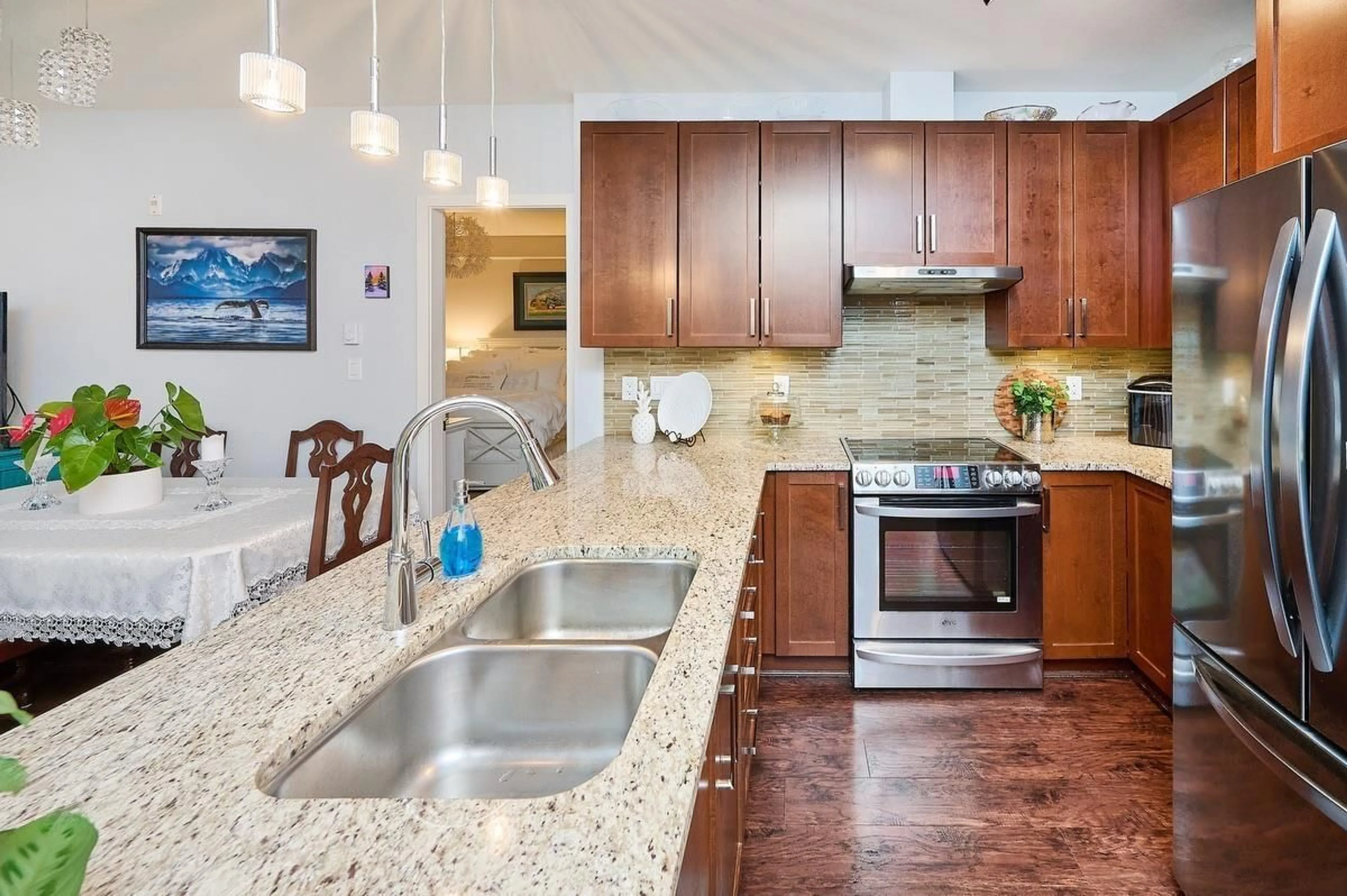 Open concept kitchen, ceramic/tile floor for 117 - 6480 194 STREET, Surrey British Columbia V4N6J9