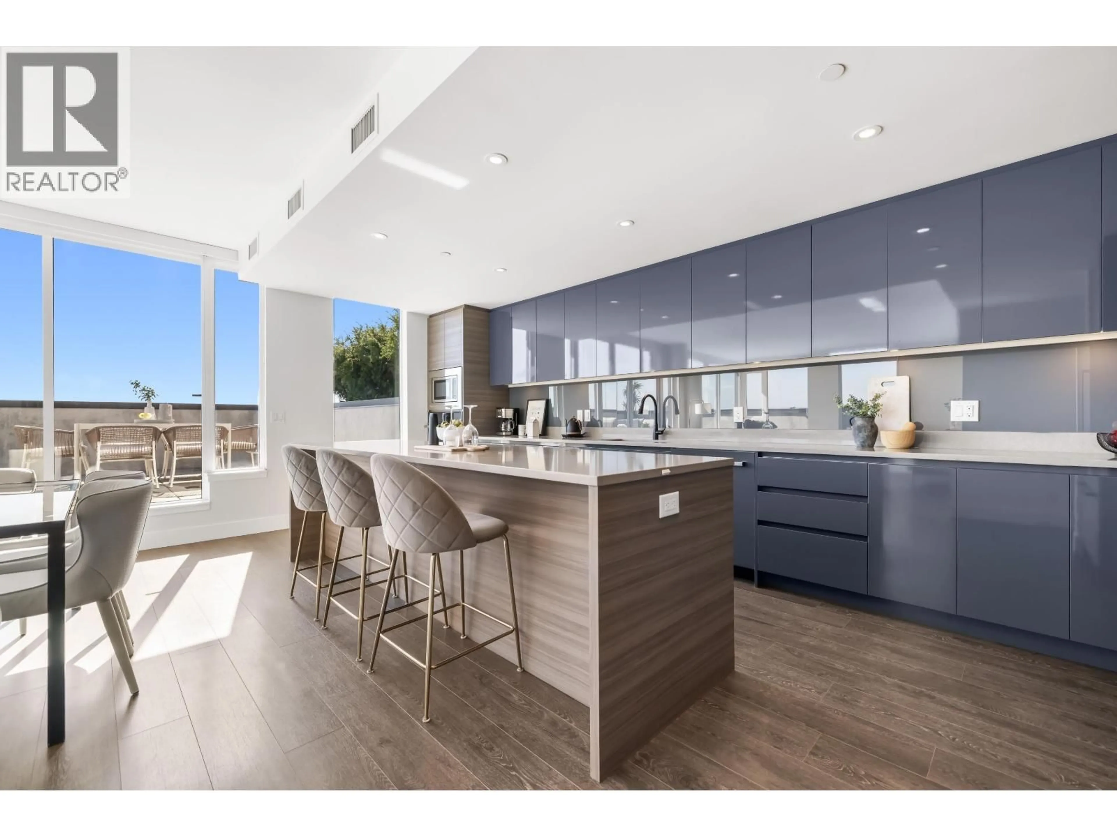 Open concept kitchen, wood/laminate floor for PH655 - 8575 RIVERGRASS DRIVE, Vancouver British Columbia V5S0J7