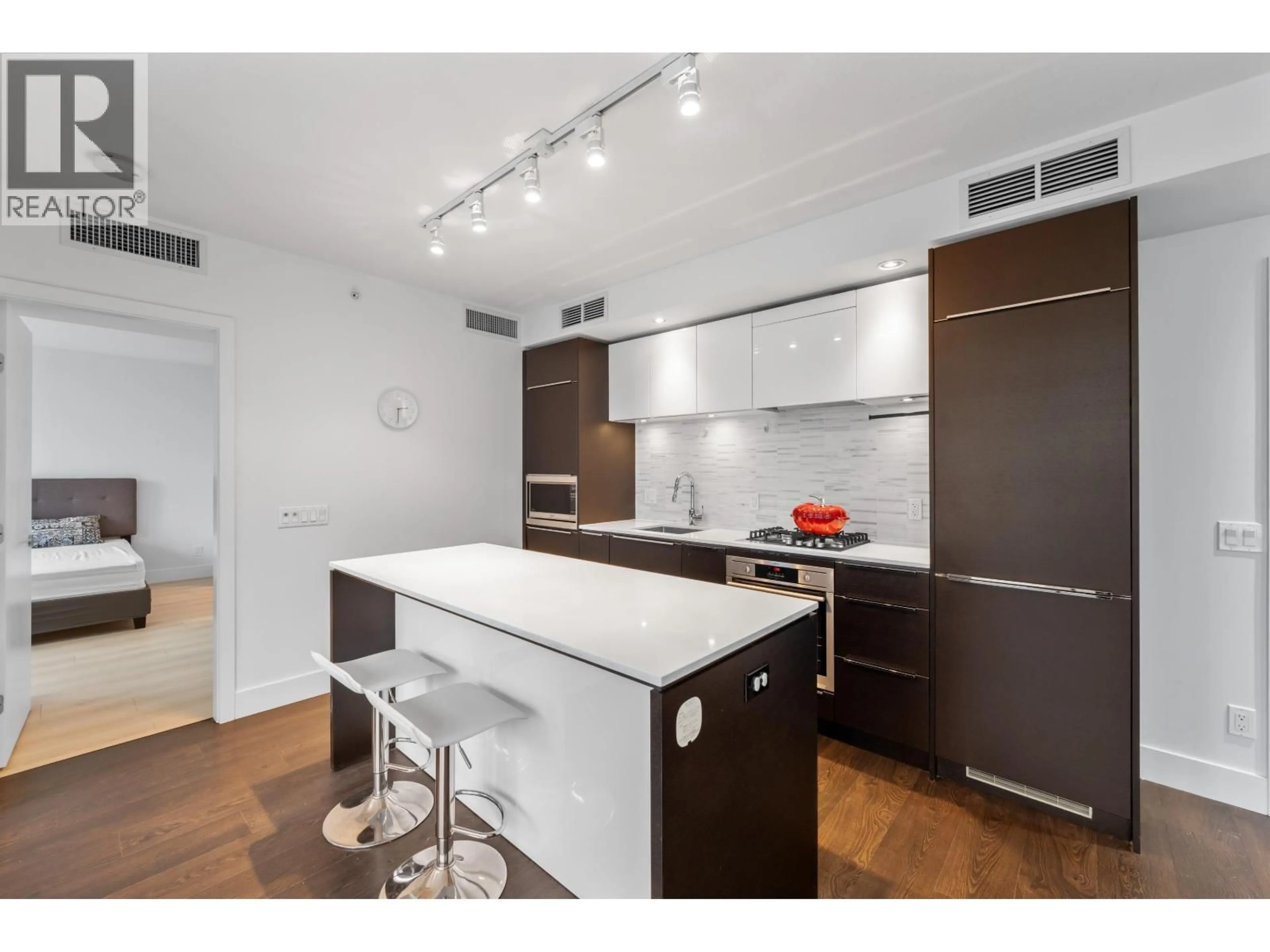 Open concept kitchen, wood/laminate floor for 621 - 5233 GILBERT ROAD, Richmond British Columbia V7C0B3