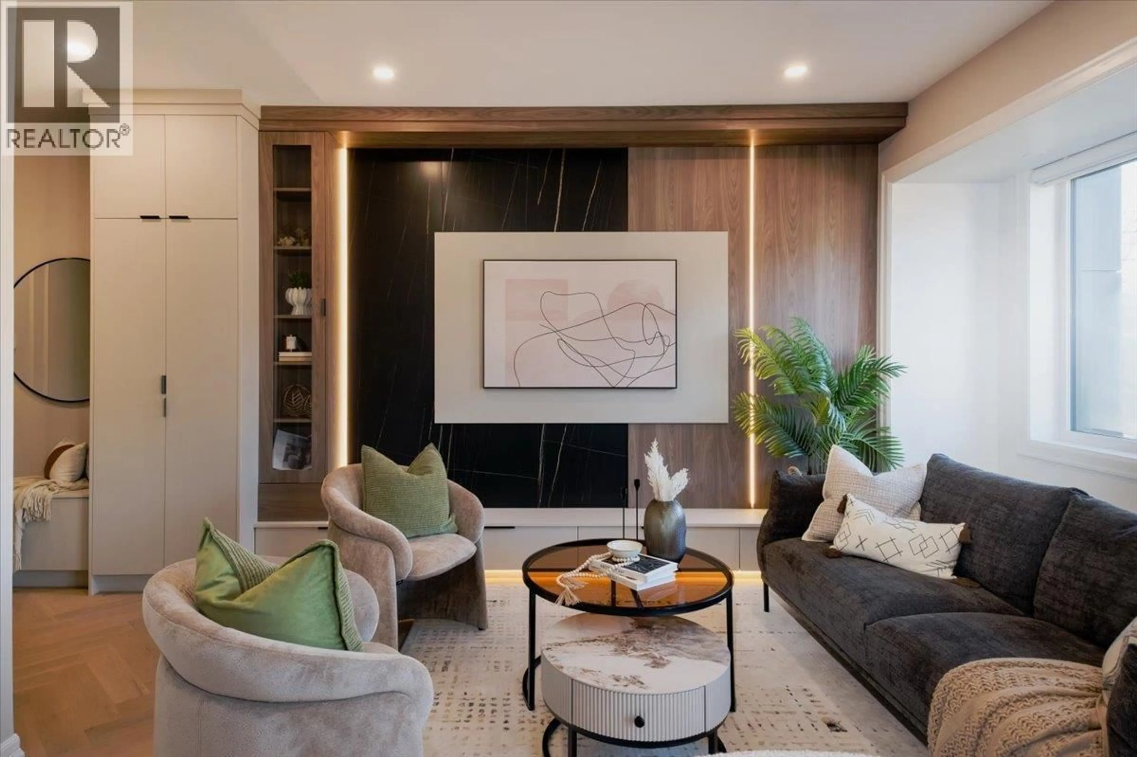 Living room with furniture, wood/laminate floor for 2 - 6061 SHERBROOKE STREET, Vancouver British Columbia V5W3N3