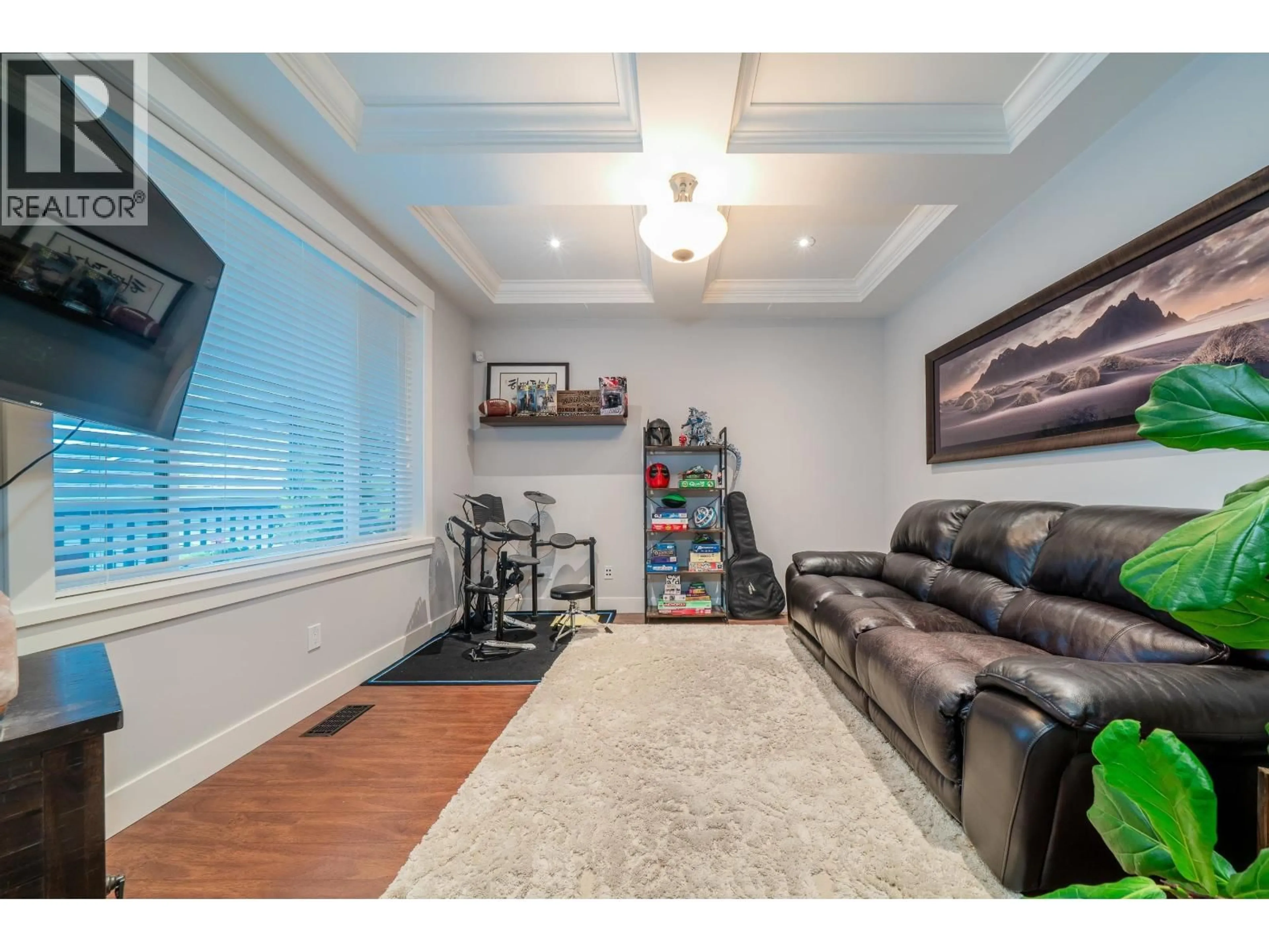 Living room with furniture, wood/laminate floor for 13439 235 STREET, Maple Ridge British Columbia V4R2W3