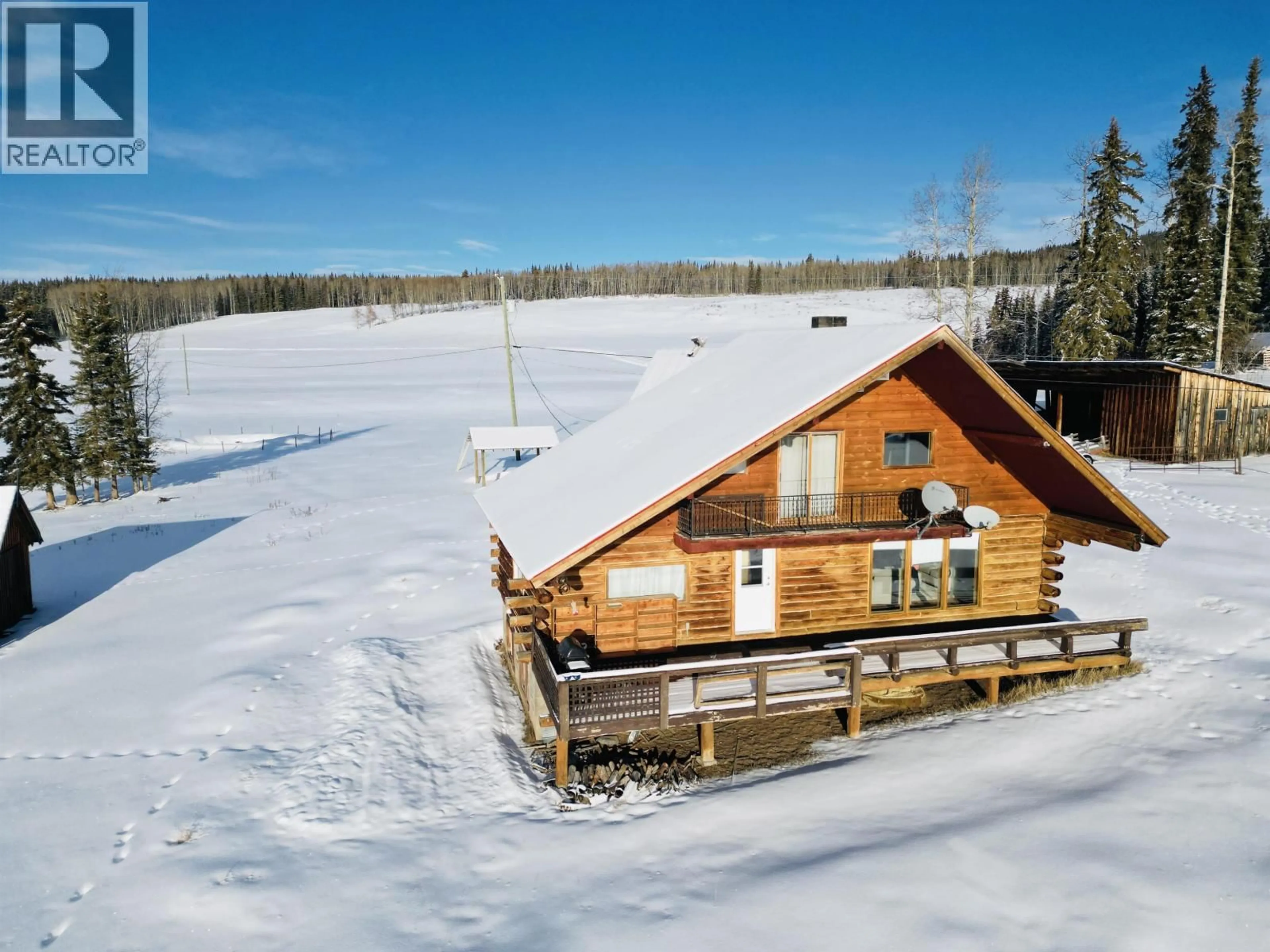 A pic from outside/outdoor area/front of a property/back of a property/a pic from drone, building for 6901 TAKYSIE PIT ROAD, Burns Lake British Columbia V0E1E4