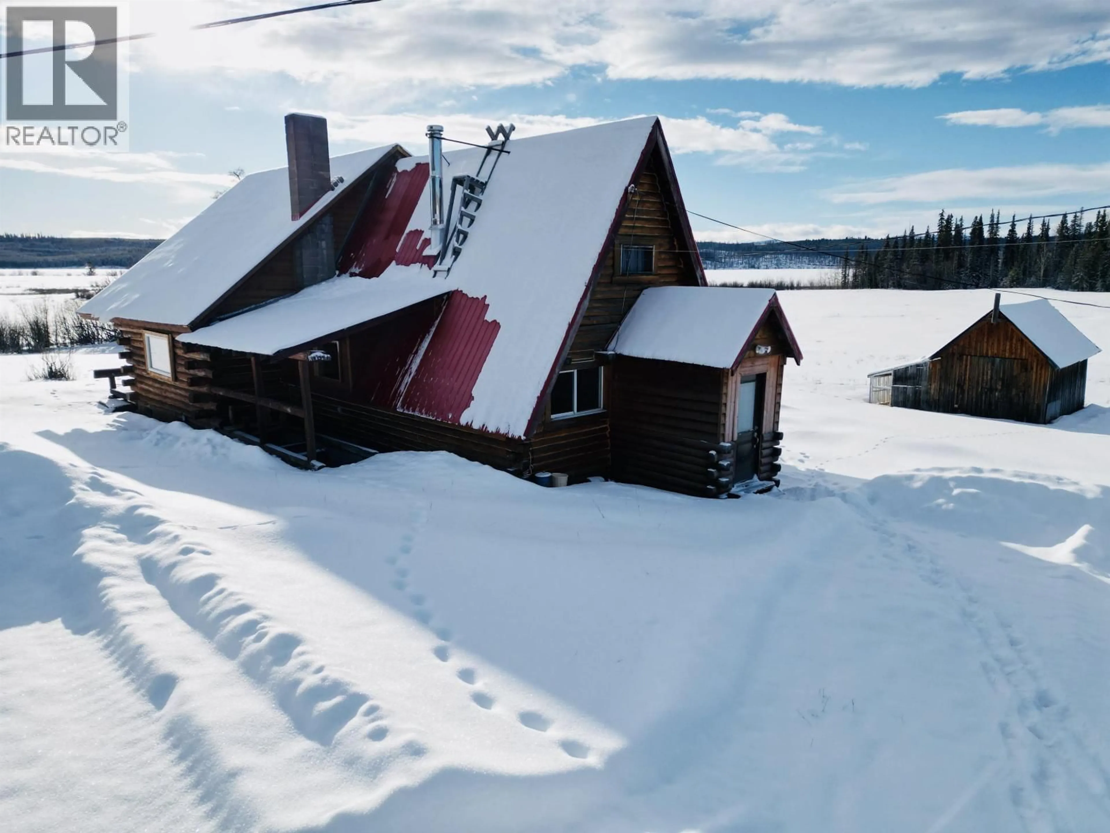 A pic from outside/outdoor area/front of a property/back of a property/a pic from drone, unknown for 6901 TAKYSIE PIT ROAD, Burns Lake British Columbia V0E1E4