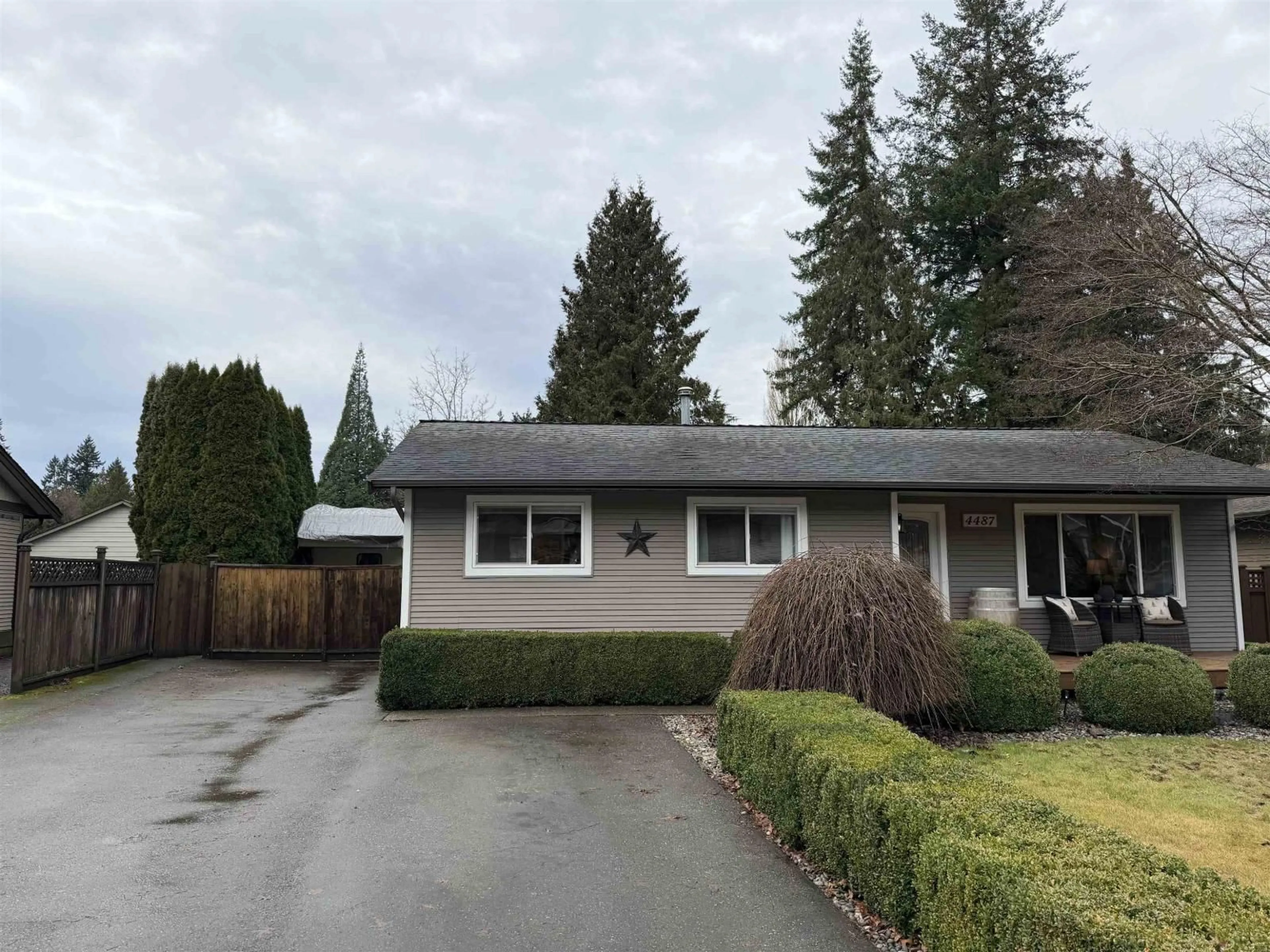 Home with vinyl exterior material, street for 4487 202 STREET, Langley British Columbia V3A6M6