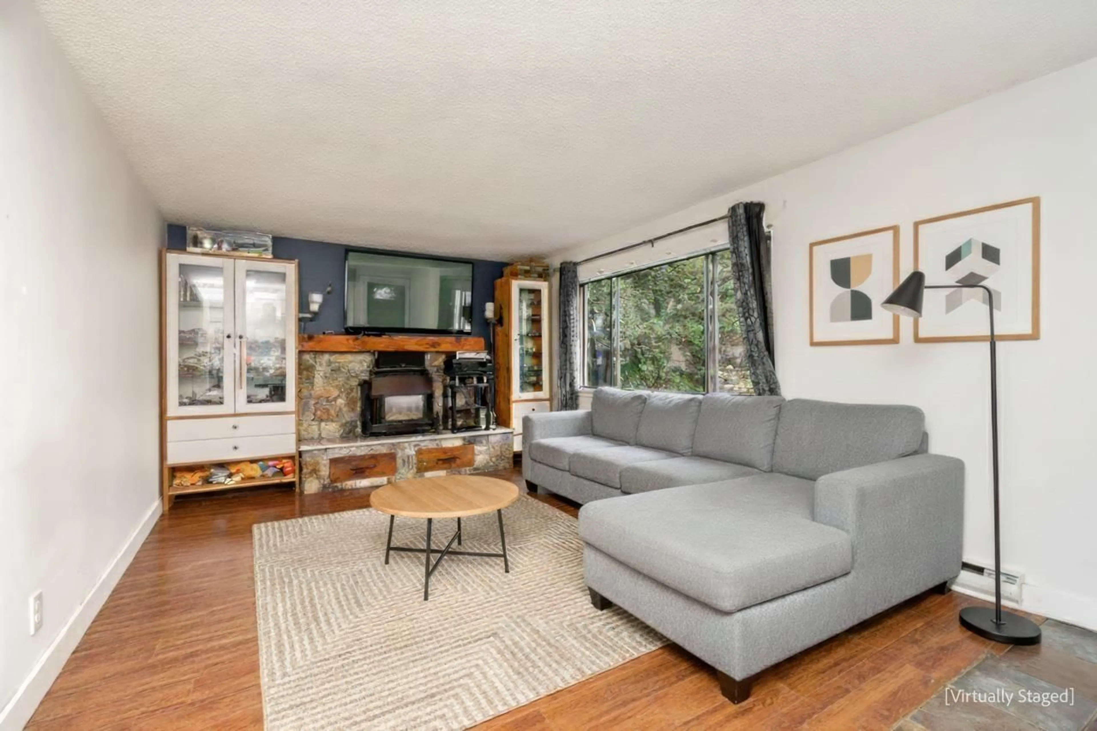 Living room with furniture, wood/laminate floor for 5345 199 STREET, Langley British Columbia V3A6T8