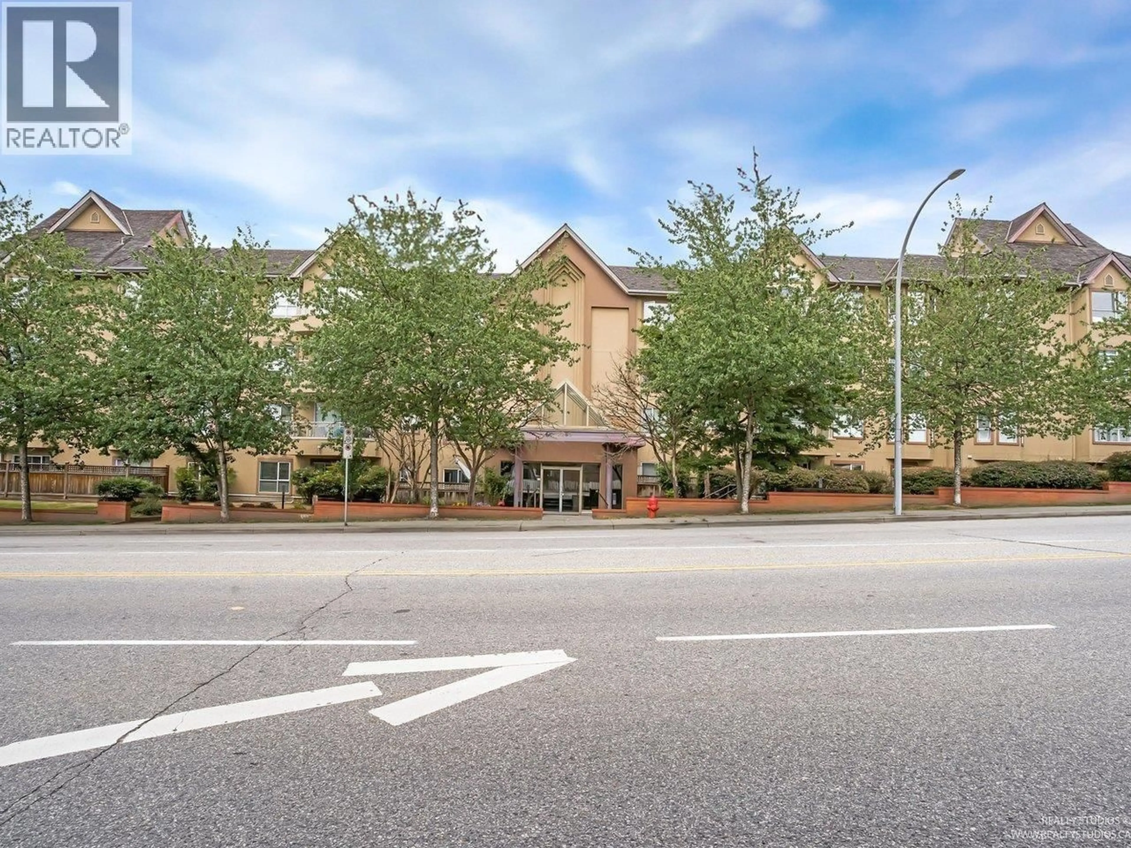 A pic from outside/outdoor area/front of a property/back of a property/a pic from drone, street for 101 - 2285 PITT RIVER ROAD, Port Coquitlam British Columbia V3C1R7