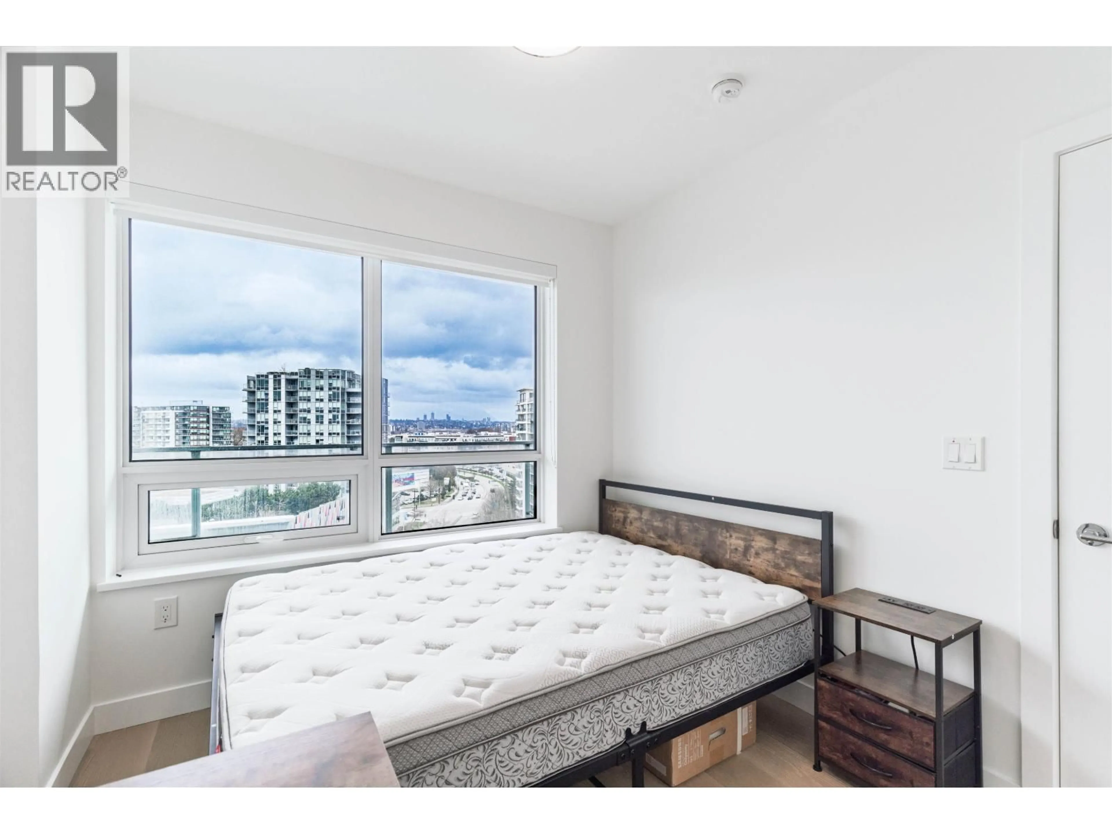 Bedroom with bed, wood/laminate floor for 1204 - 5766 GILBERT ROAD, Richmond British Columbia V7C0G2