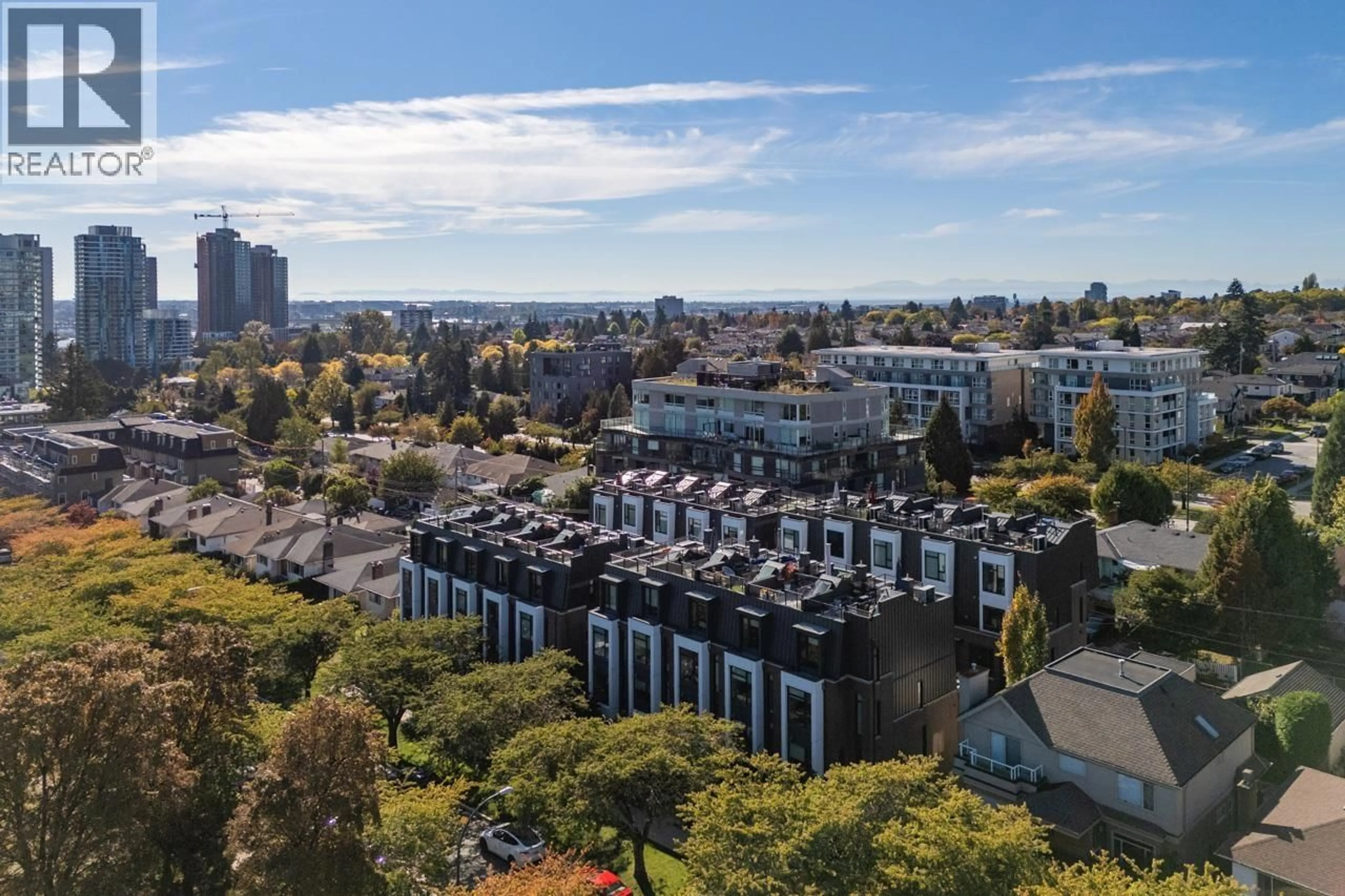 A pic from outside/outdoor area/front of a property/back of a property/a pic from drone, city buildings view from balcony for 7599 YUKON STREET, Vancouver British Columbia V5X2Y4