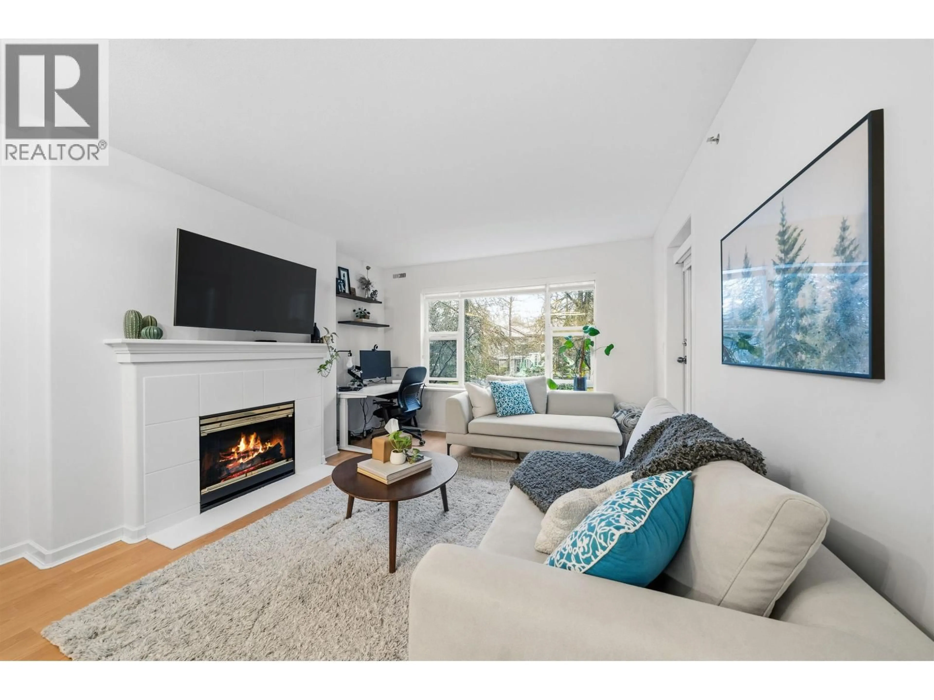 Living room with furniture, unknown for 210 - 5281 OAKMOUNT CRESCENT, Burnaby British Columbia V5H4S7