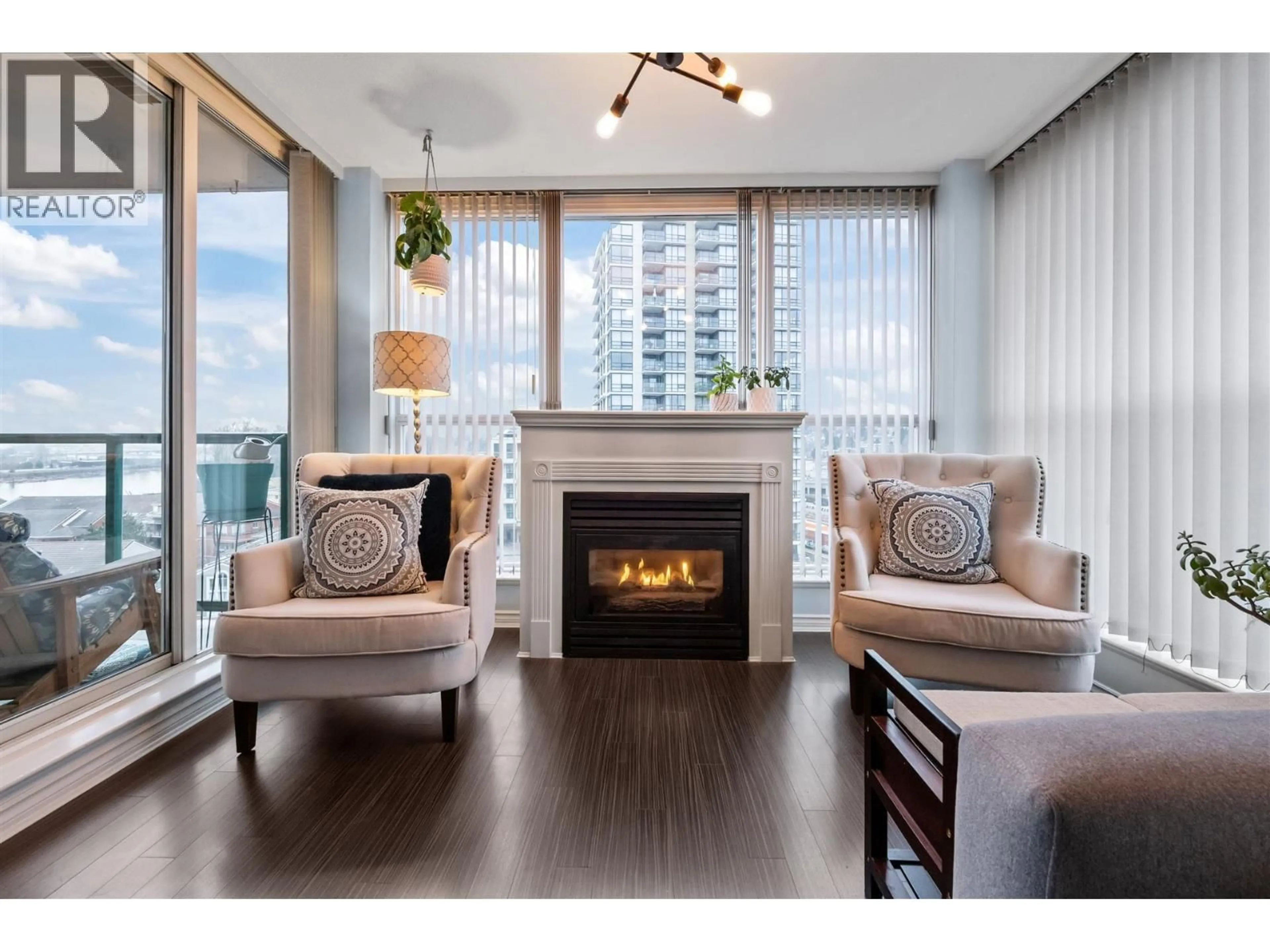 Living room with furniture, wood/laminate floor for 1006 - 10 LAGUNA COURT, New Westminster British Columbia V3M6W3