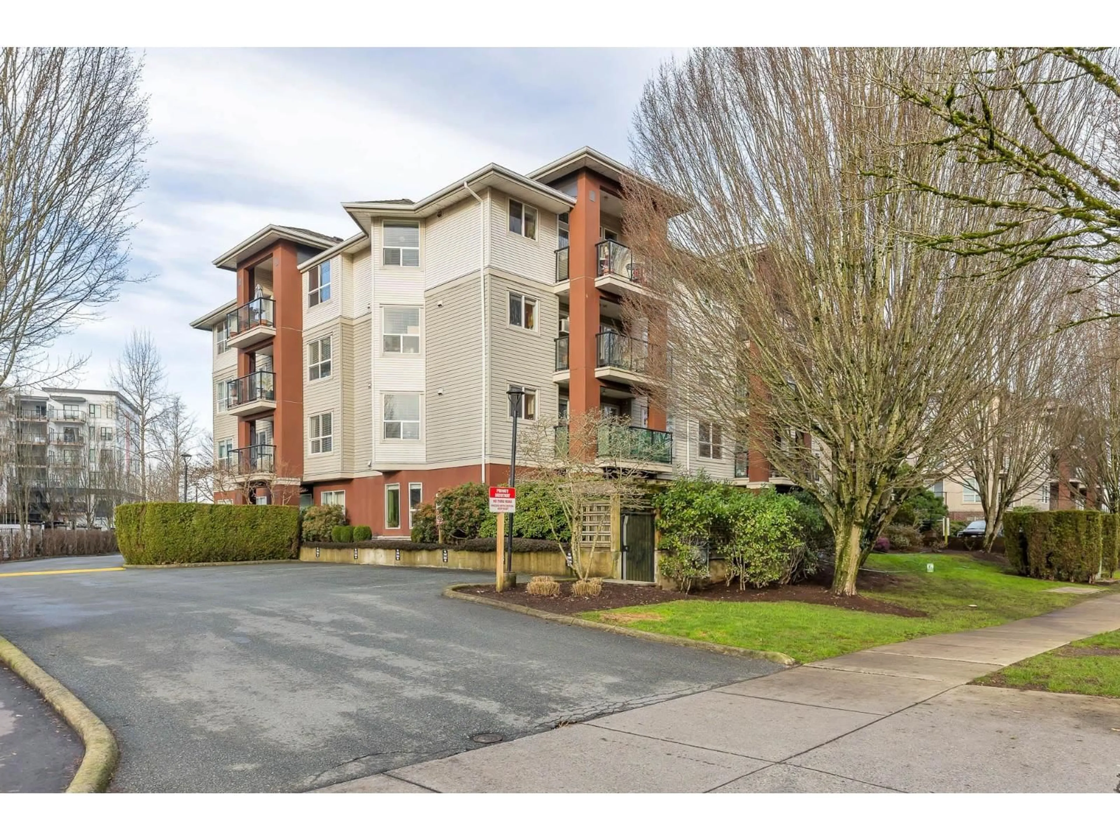 A pic from outside/outdoor area/front of a property/back of a property/a pic from drone, street for 308 - 20239 MICHAUD CRESCENT, Langley British Columbia V3A8L1