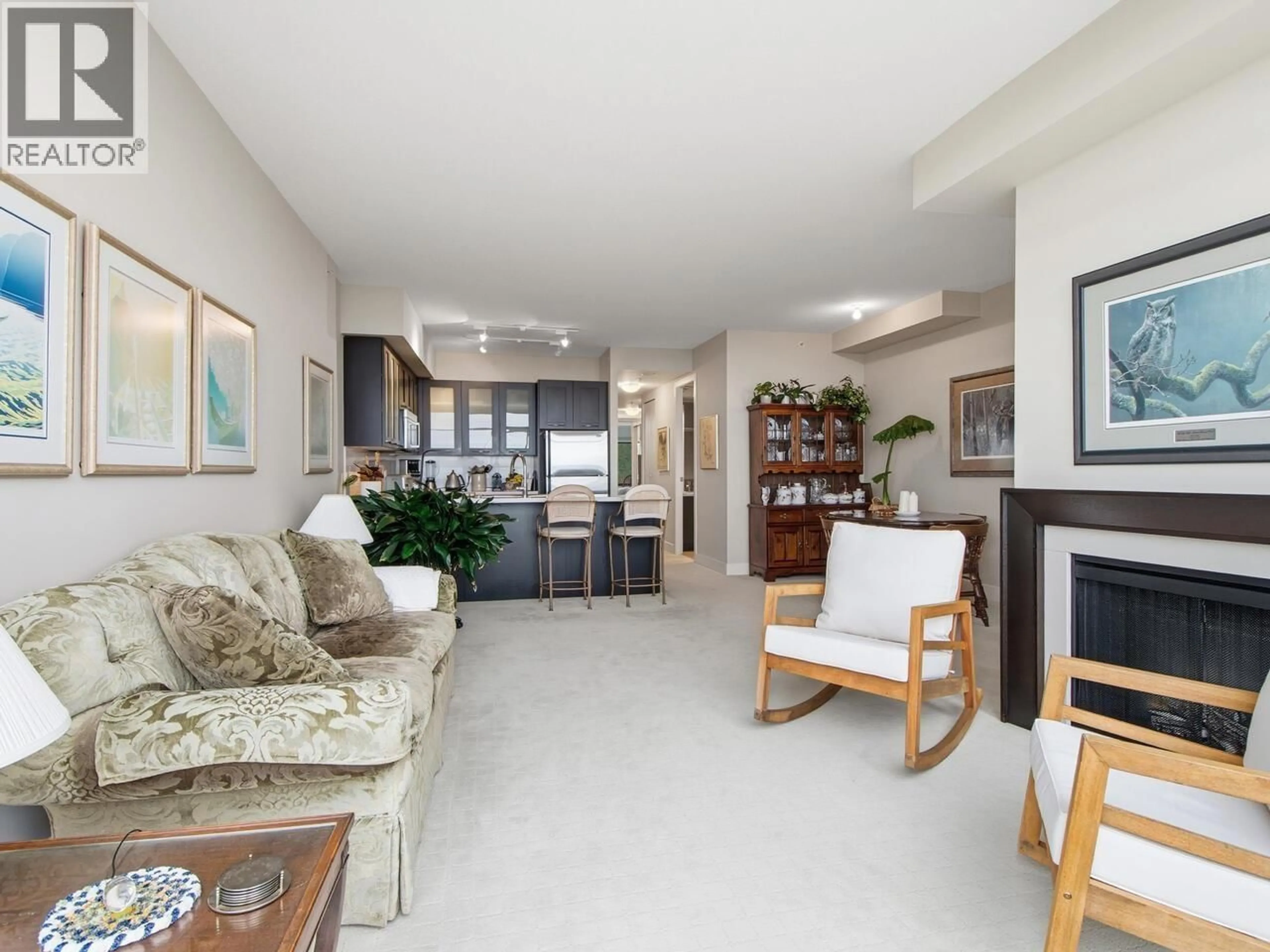 Living room with furniture, unknown for 900 - 9300 UNIVERSITY CRESCENT, Burnaby British Columbia V5A4X9