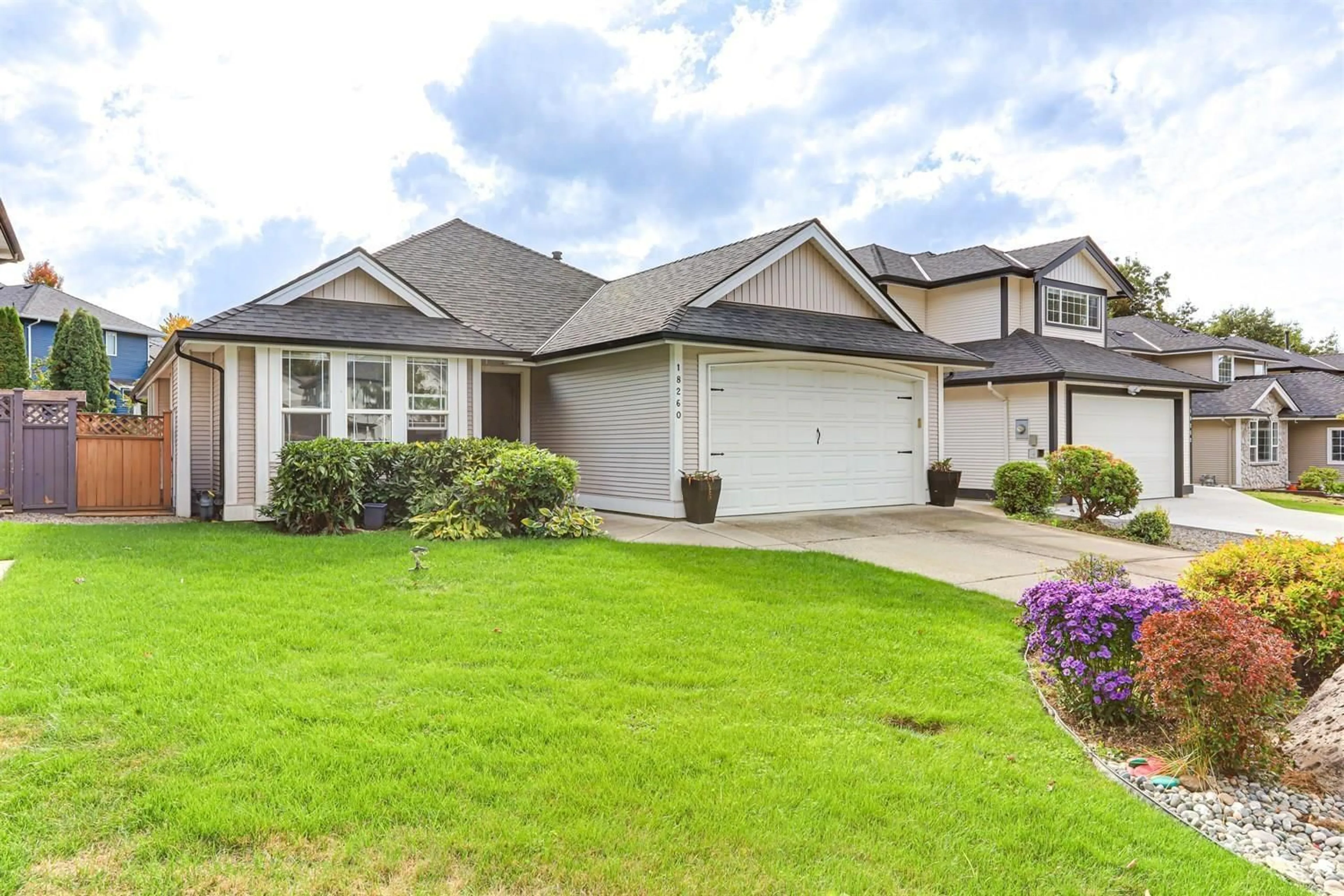 Home with vinyl exterior material, street for 18260 69 AVENUE, Surrey British Columbia V3S9H5