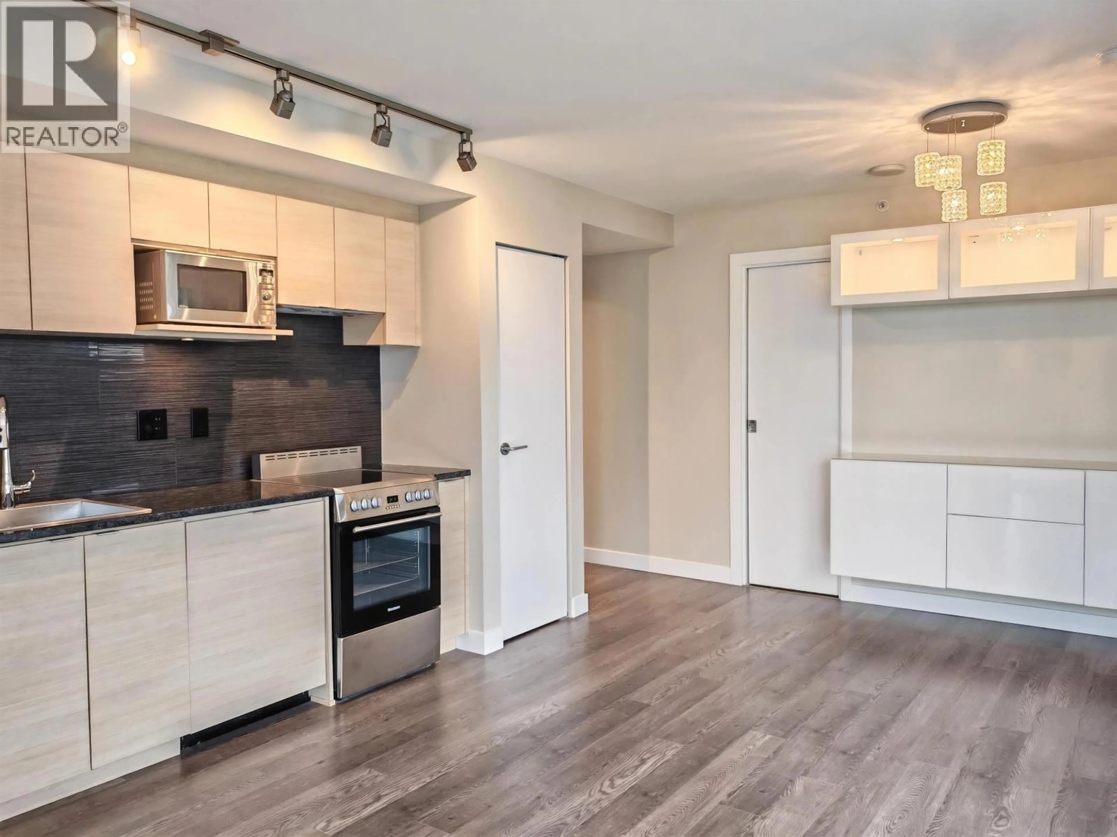 Open concept kitchen, wood/laminate floor for 2007 - 489 INTERURBAN WAY, Vancouver British Columbia V5X0C7