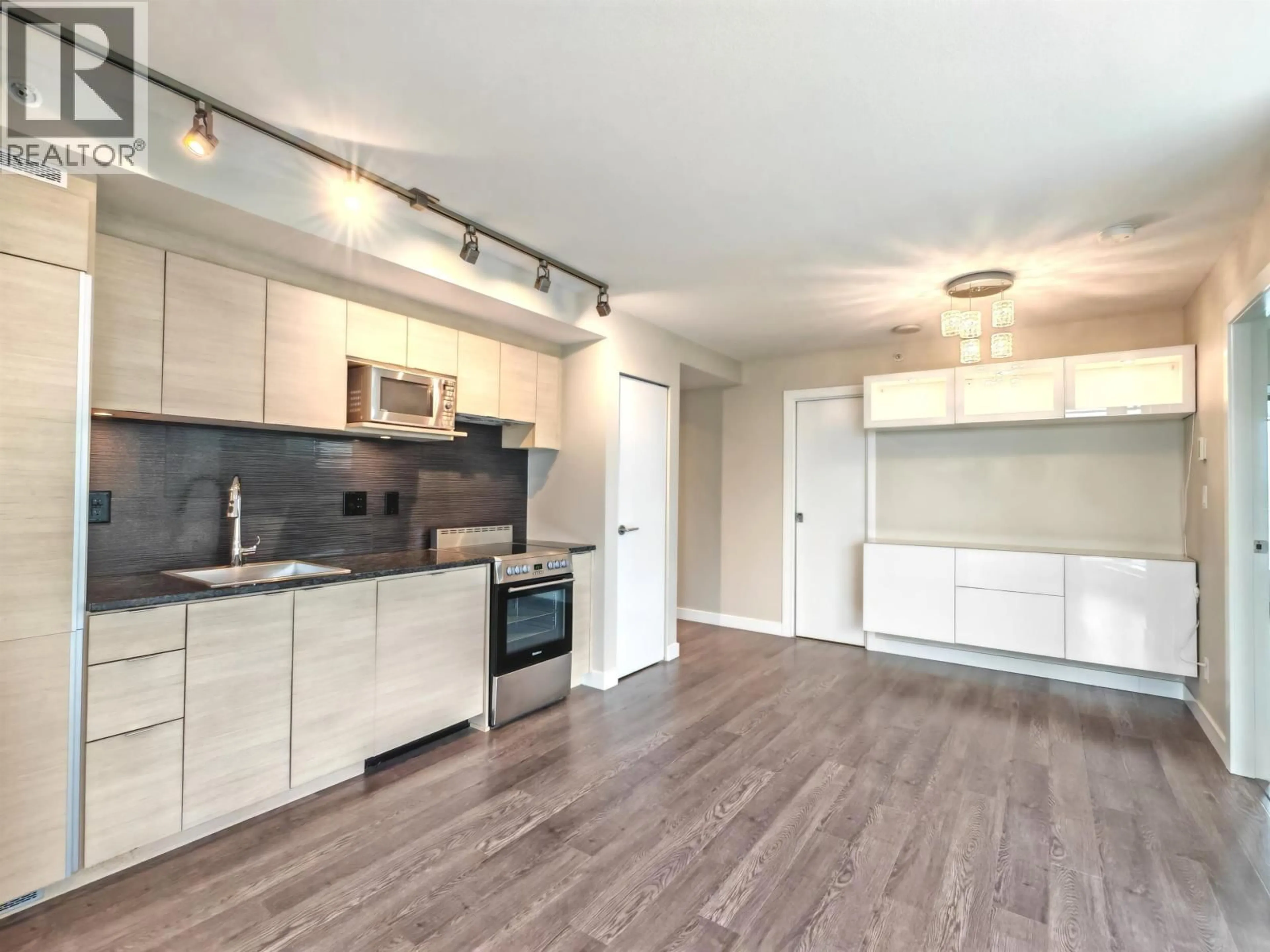 Open concept kitchen, wood/laminate floor for 2007 - 489 INTERURBAN WAY, Vancouver British Columbia V5X0C7