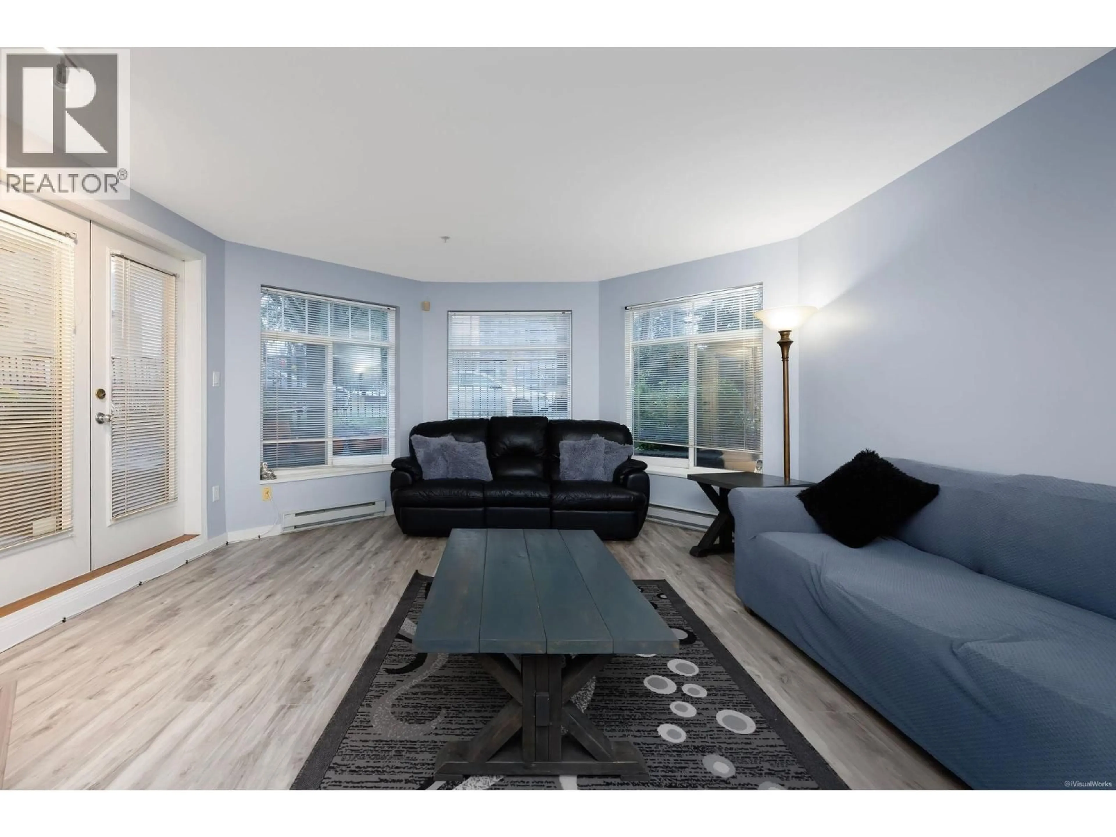 Living room with furniture, wood/laminate floor for 111 - 12207 224 STREET, Maple Ridge British Columbia V2X6B9