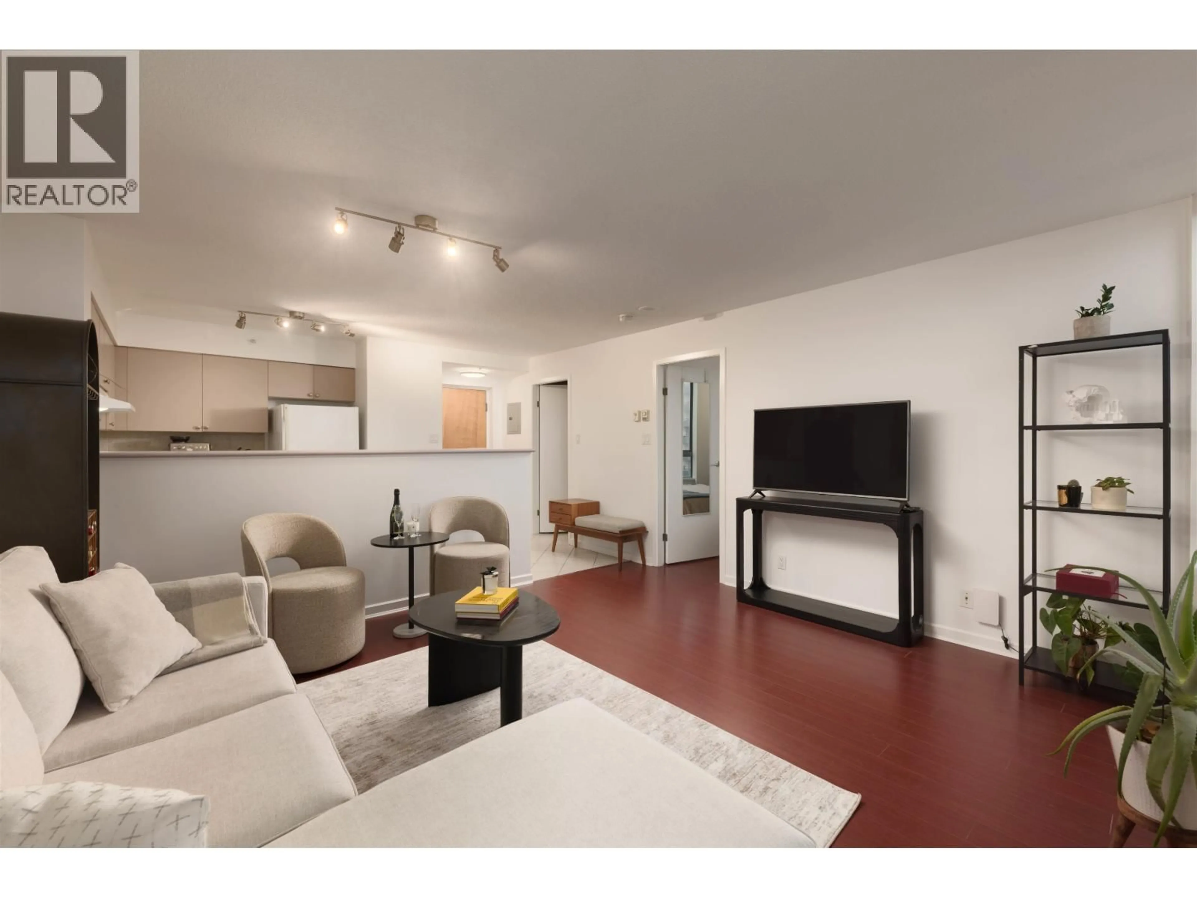 Living room with furniture, wood/laminate floor for 1207 - 1277 NELSON STREET, Vancouver British Columbia V6E4M8