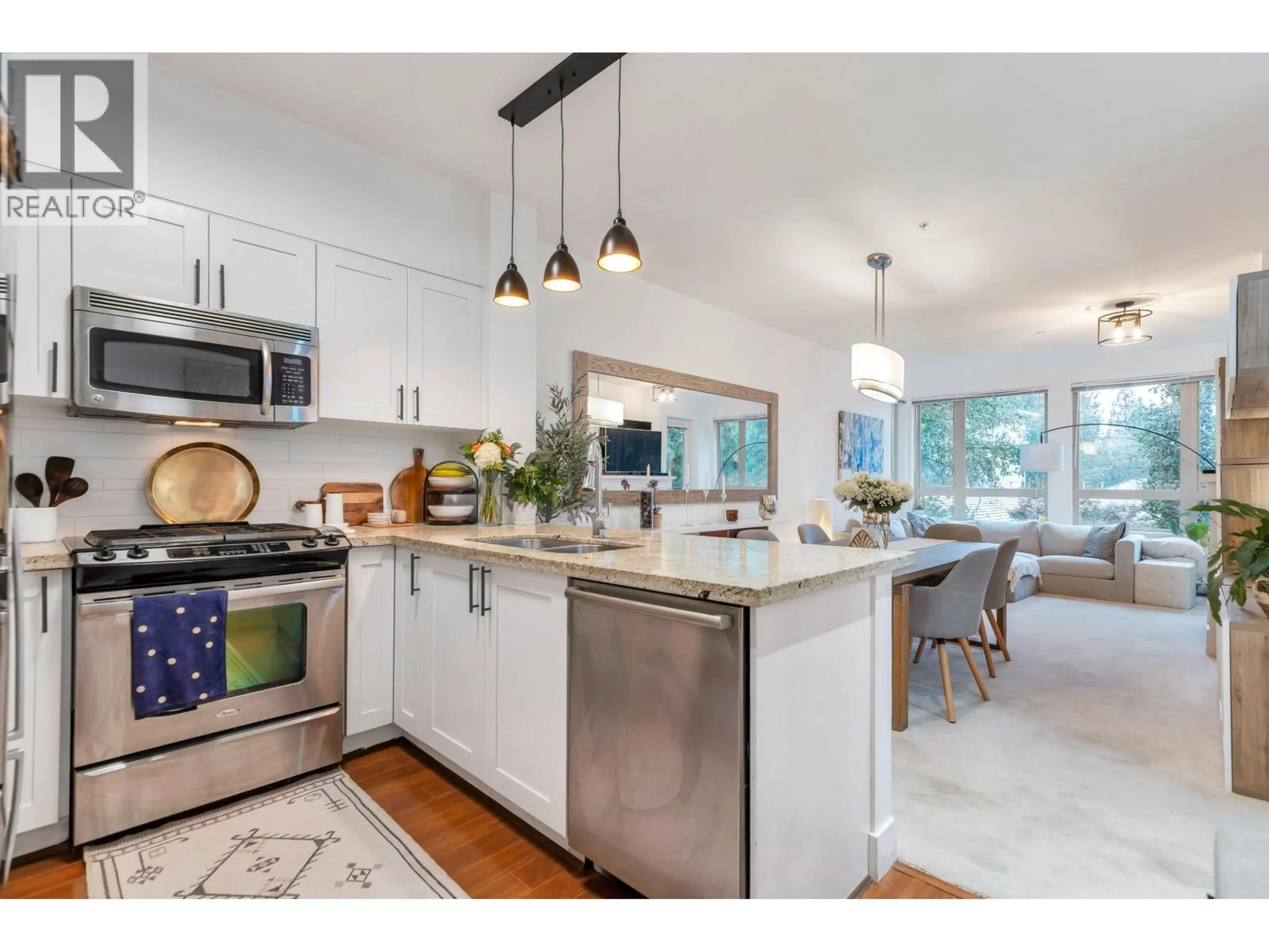 Open concept kitchen, unknown for 310 - 1111 27TH STREET, North Vancouver British Columbia V7J1S3