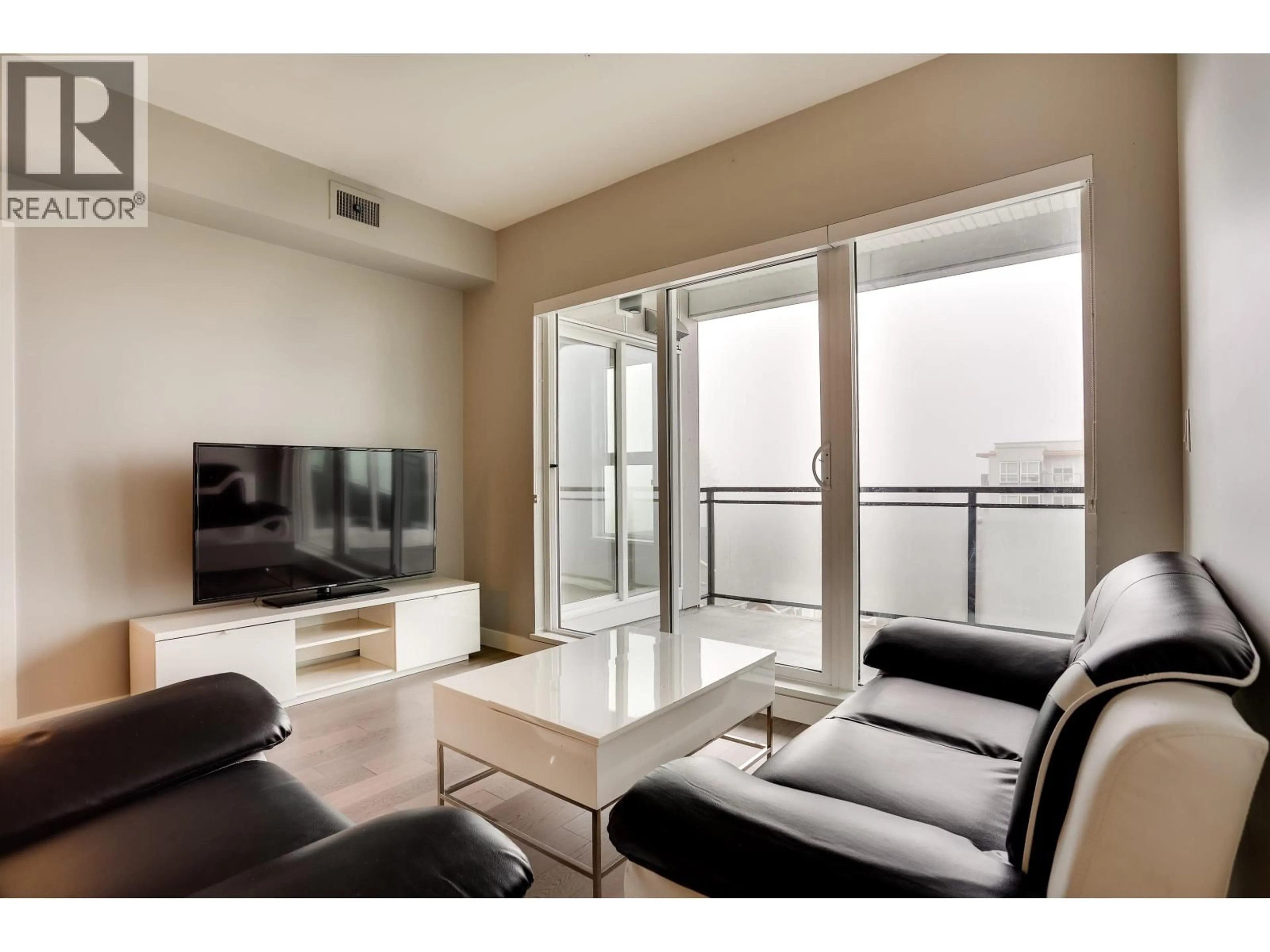 Living room with furniture, wood/laminate floor for 608 - 10177 RIVER DRIVE, Richmond British Columbia V6X0S2