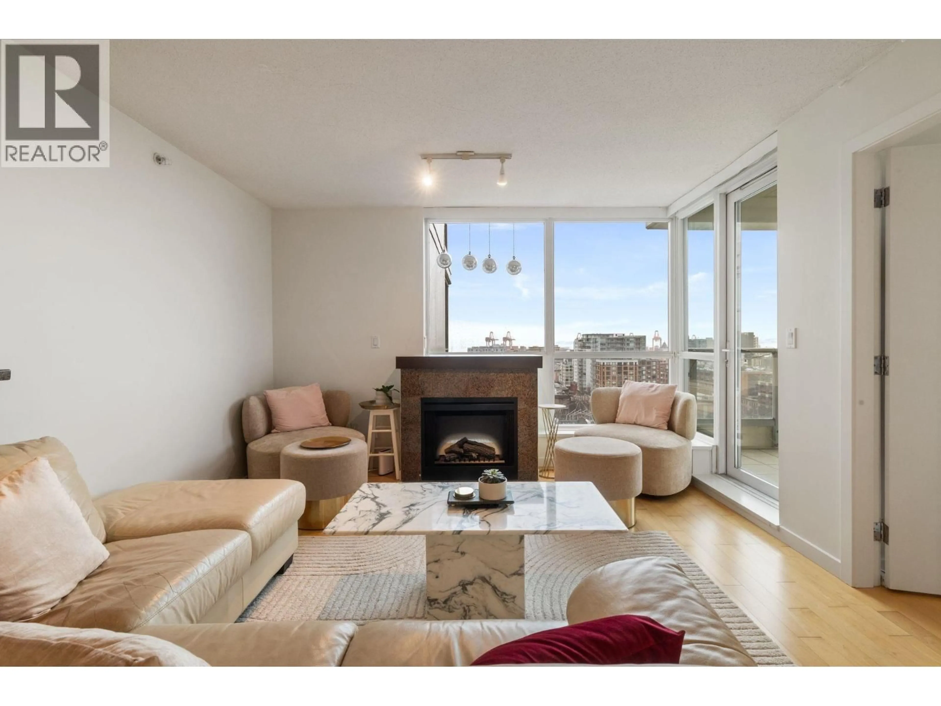 Living room with furniture, wood/laminate floor for 1702 - 125 MILROSS AVENUE, Vancouver British Columbia V6A0A1